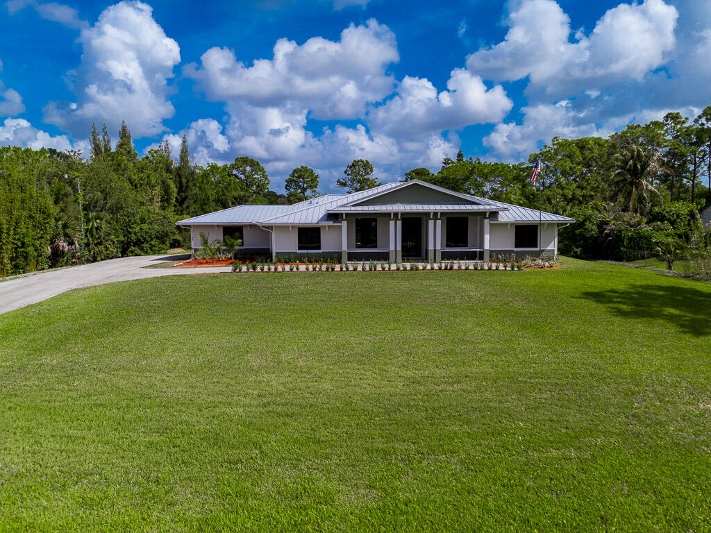 Foto de propiedad en 11165 Tangerine Boulevard, West Palm Beach, FL 33412 West Palm Beach con MLS# 