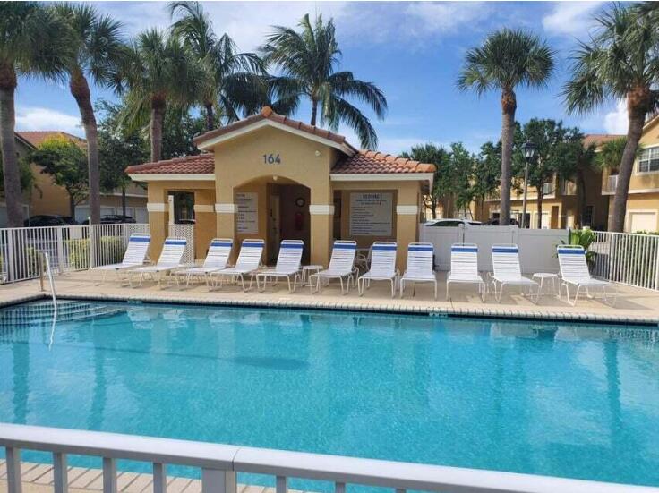 Foto de propiedad en 158 Village Boulevard D, Tequesta, FL 33469 Tequesta con MLS# 