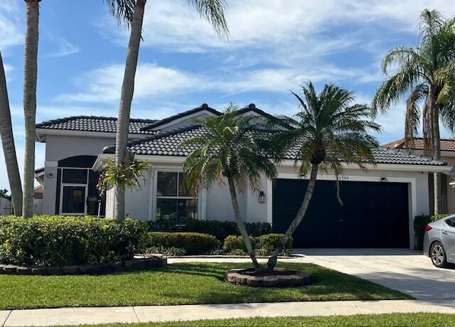Foto de propiedad en 6304 Barton Creek Circle, Lake Worth, FL 33463 Lake Worth con MLS# 