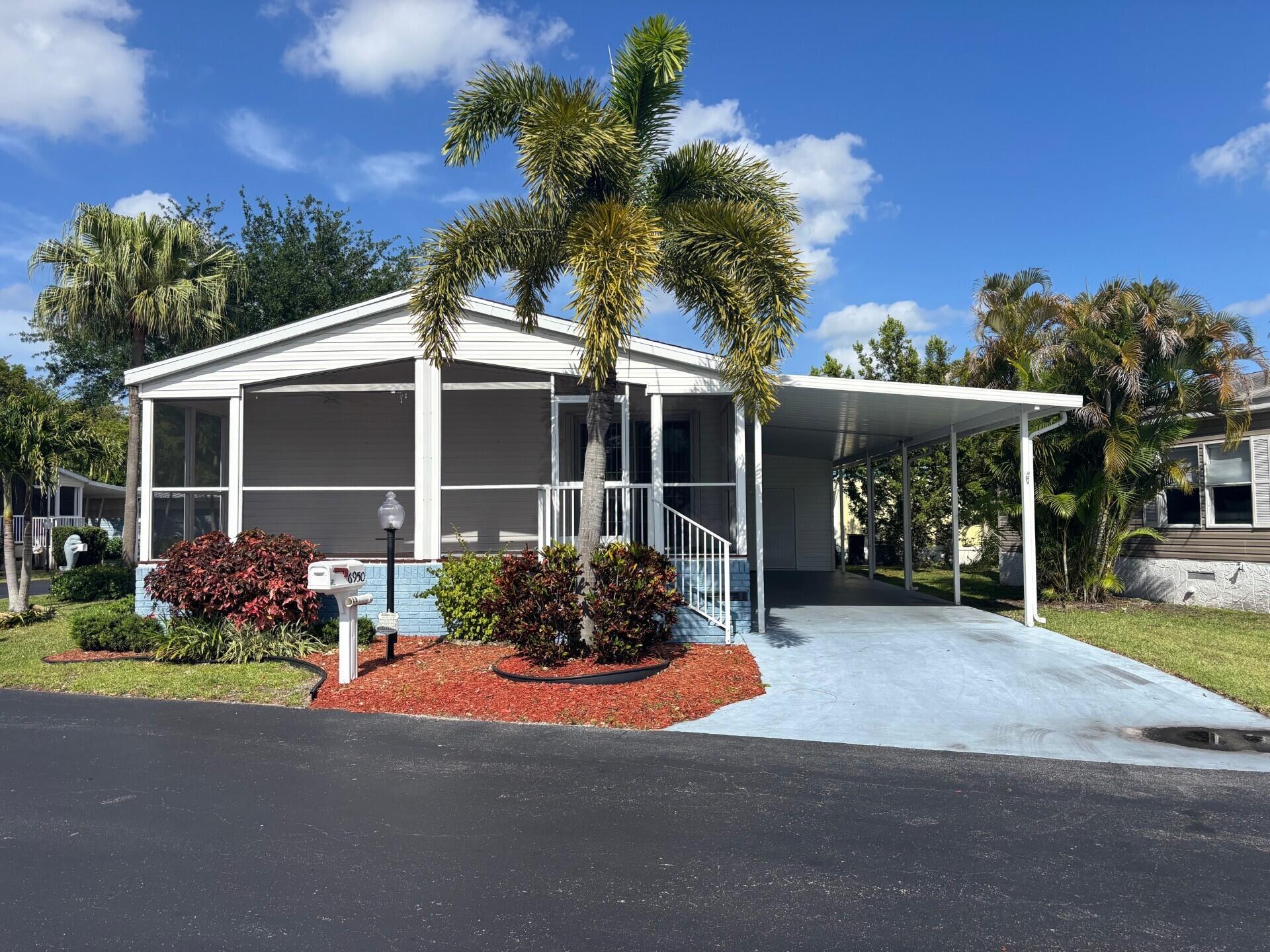 Foto de propiedad en 6950 NW 44th Avenue, Coconut Creek, FL 33073 Coconut Creek con MLS# 