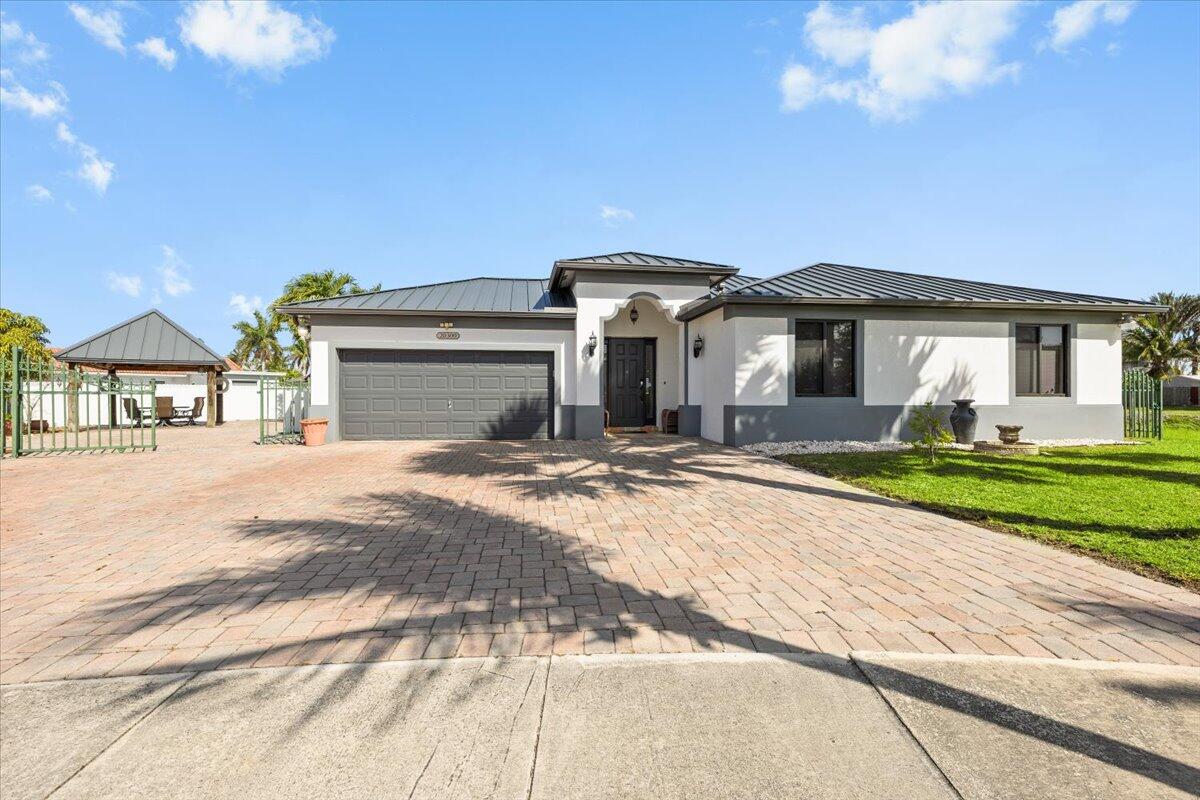 Foto de propiedad en 20300 SW 129th Place, Miami, FL 33177 Miami con MLS# 