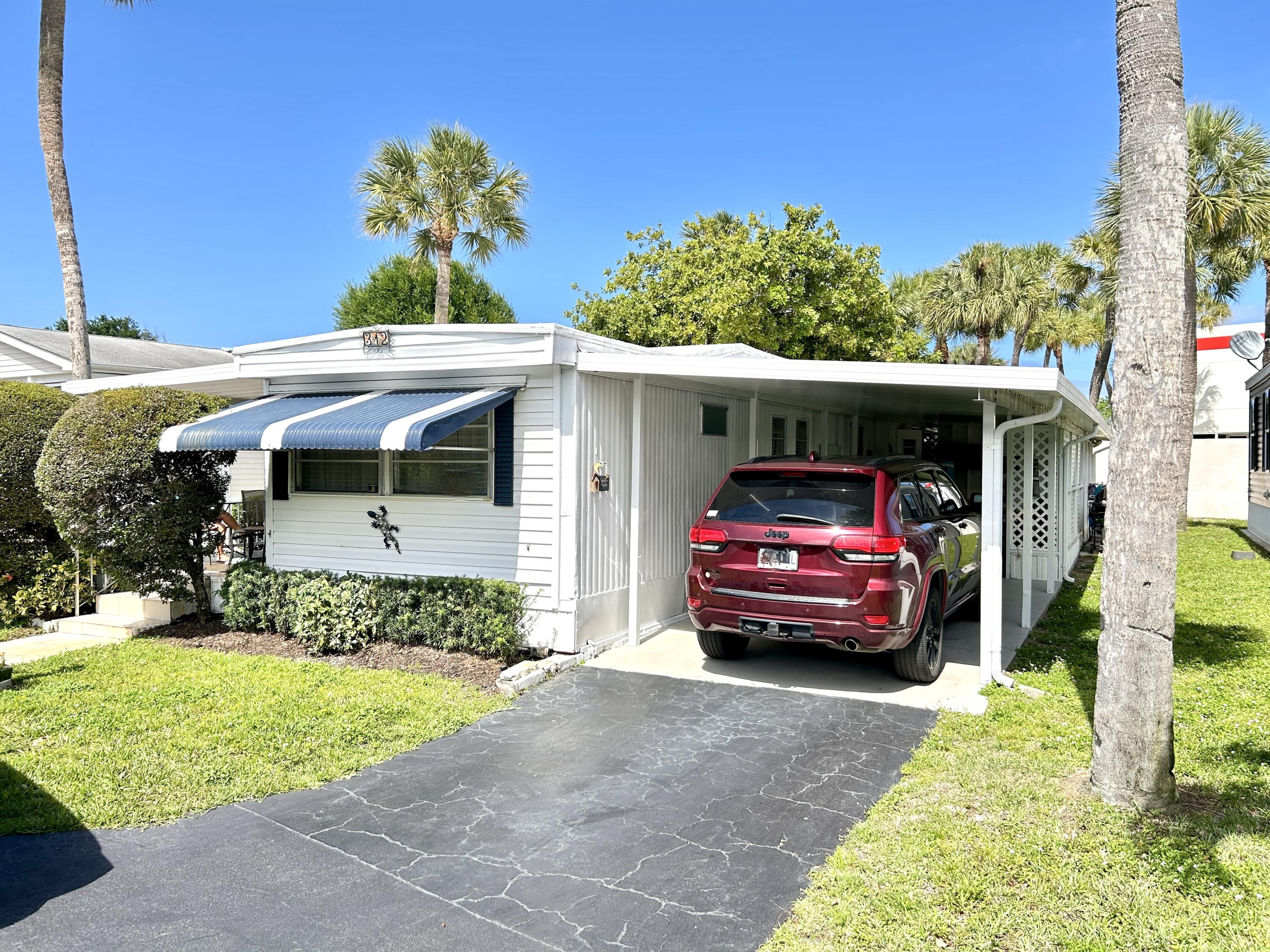 Foto de propiedad en 312 Hibiscus Drive, Deerfield Beach, FL 33442 Deerfield Beach con MLS# 