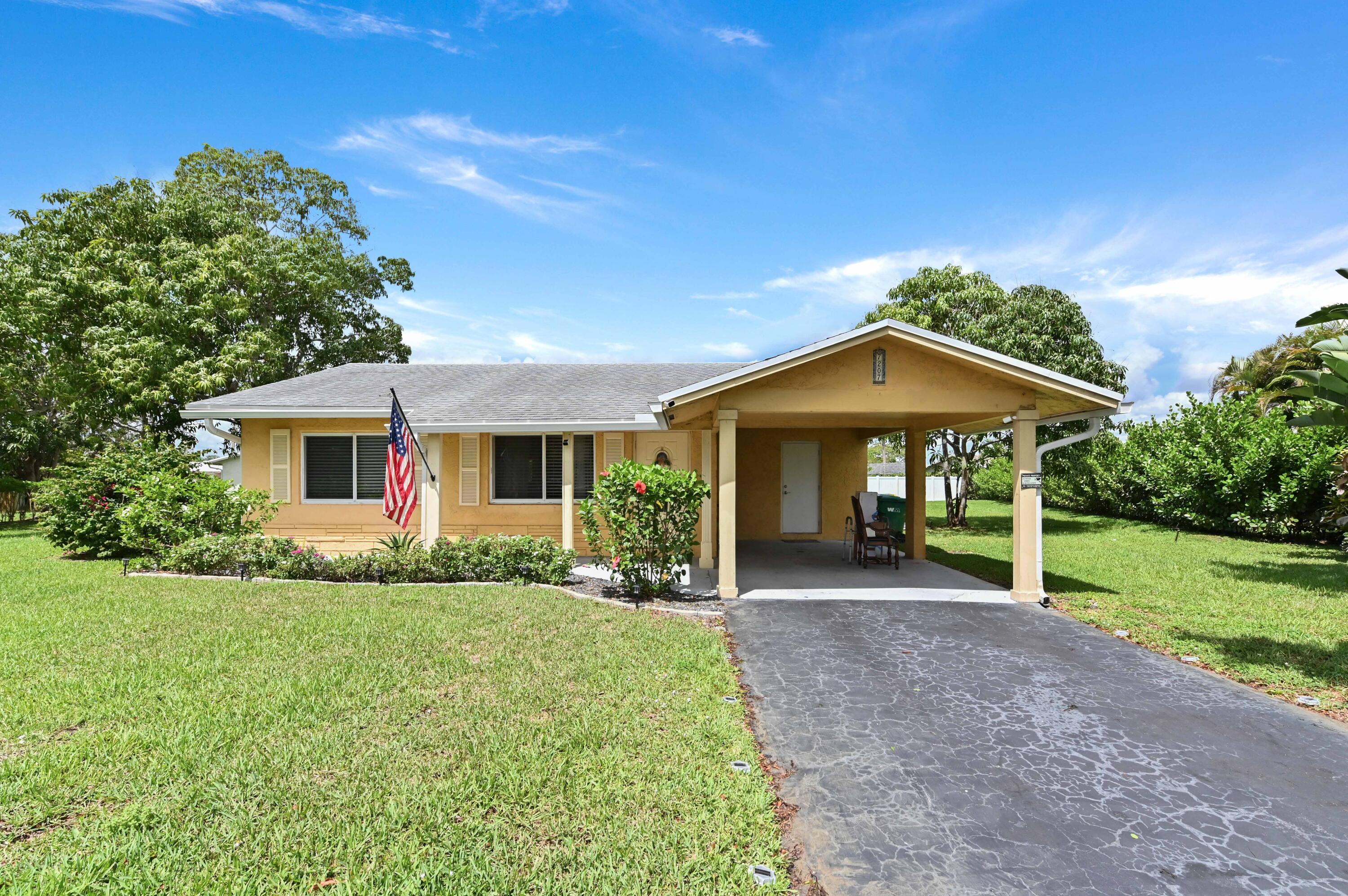 Foto de propiedad en 7207 NW 92nd Avenue, Tamarac, FL 33321 Tamarac con MLS# 
