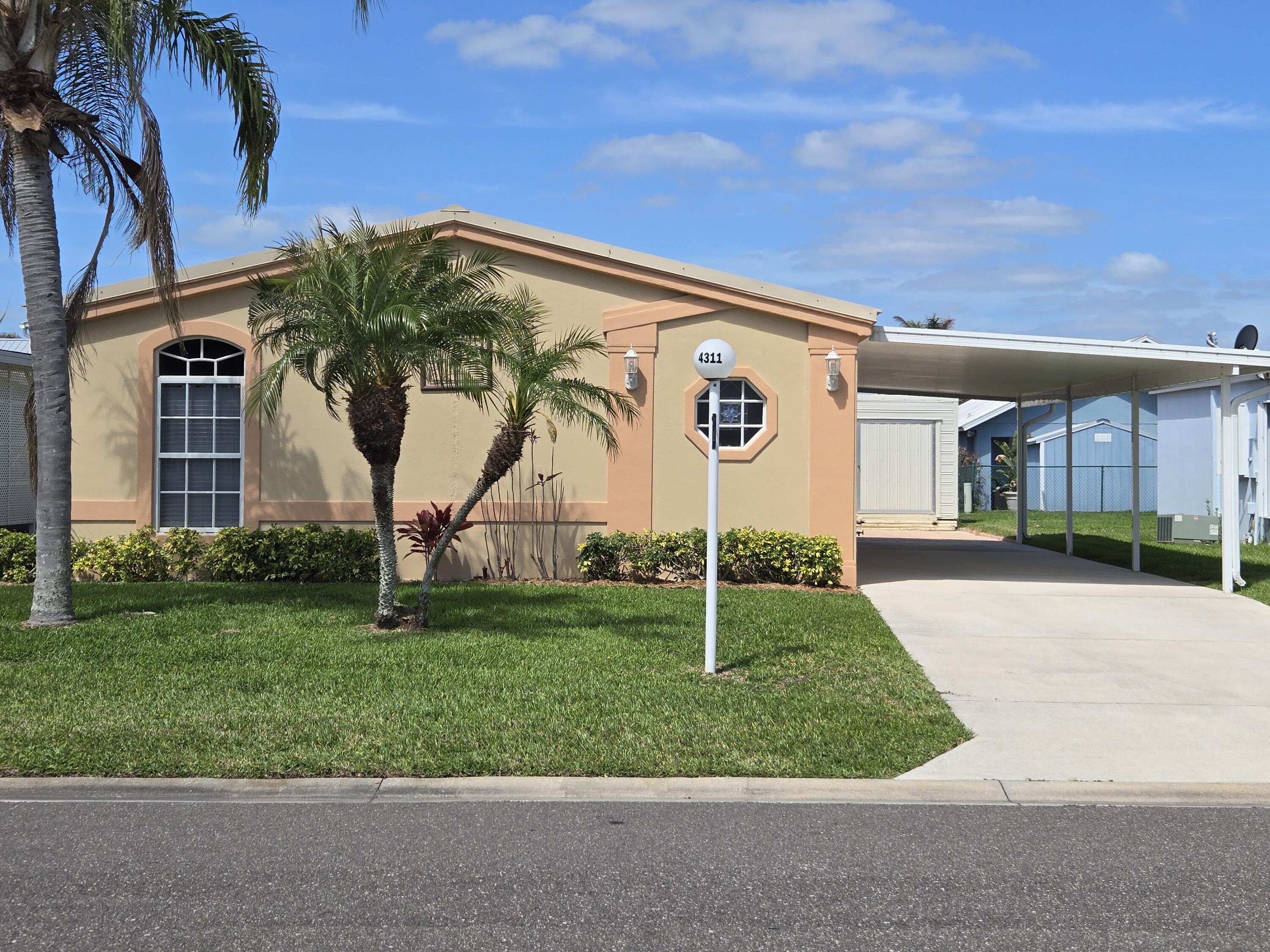 Foto de propiedad en 4311 SW 9th Way, Okeechobee, FL 34974 Okeechobee con MLS# 