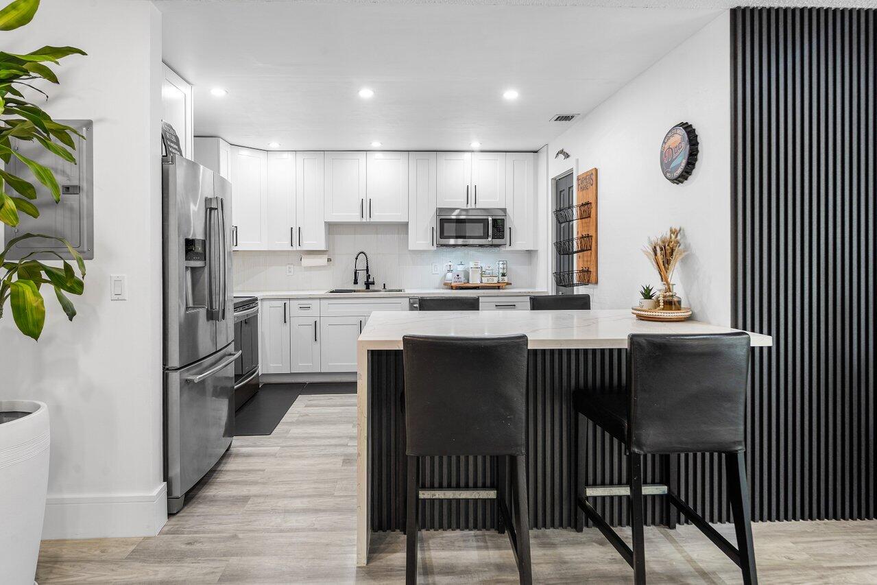 Foto de propiedad en 8014 Ambach Way, Hypoluxo, FL 33462 Hypoluxo con MLS# 