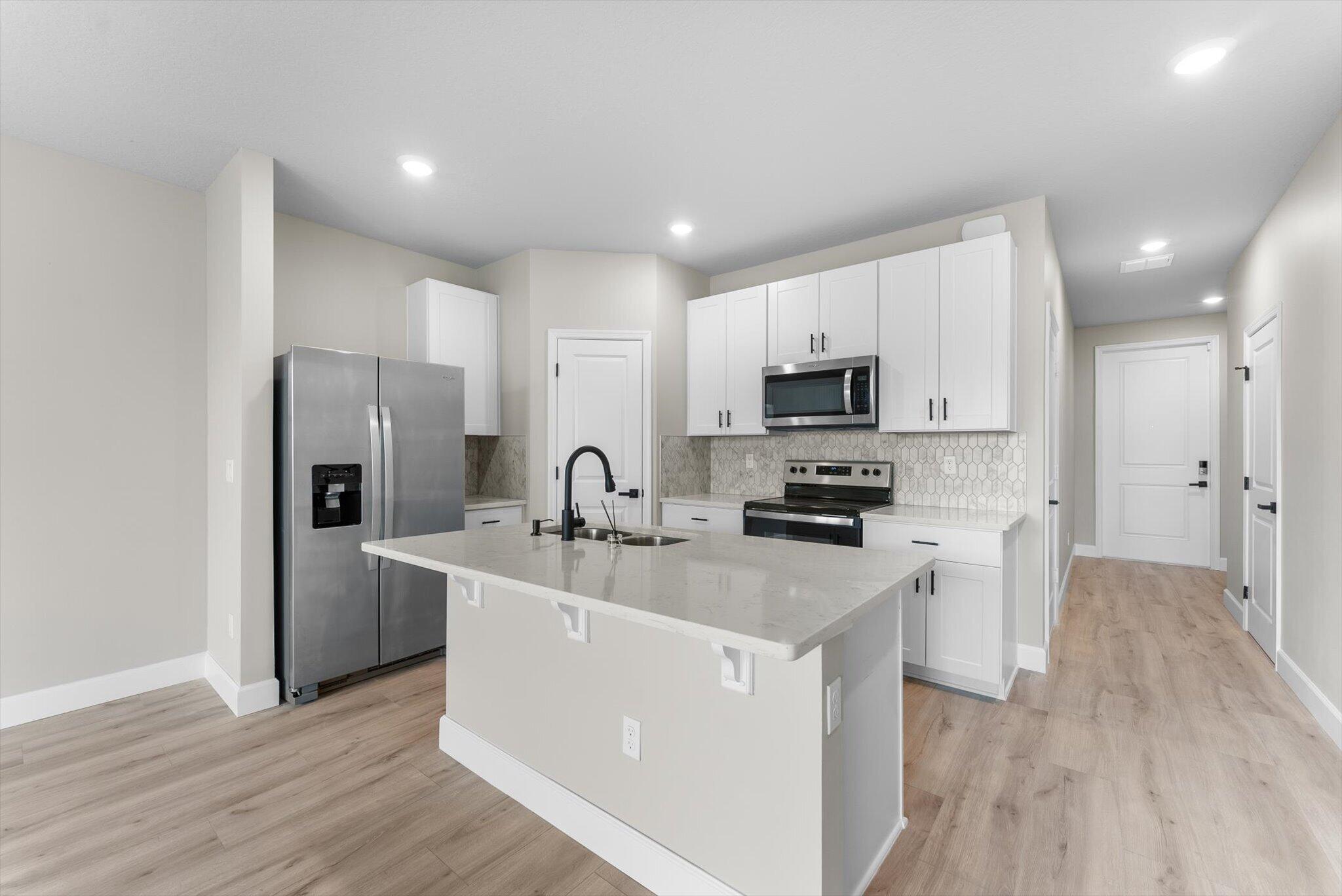 Foto de propiedad en 5661 Mentmore Drive, Mangonia Park, FL 33407 Mangonia Park con MLS# 