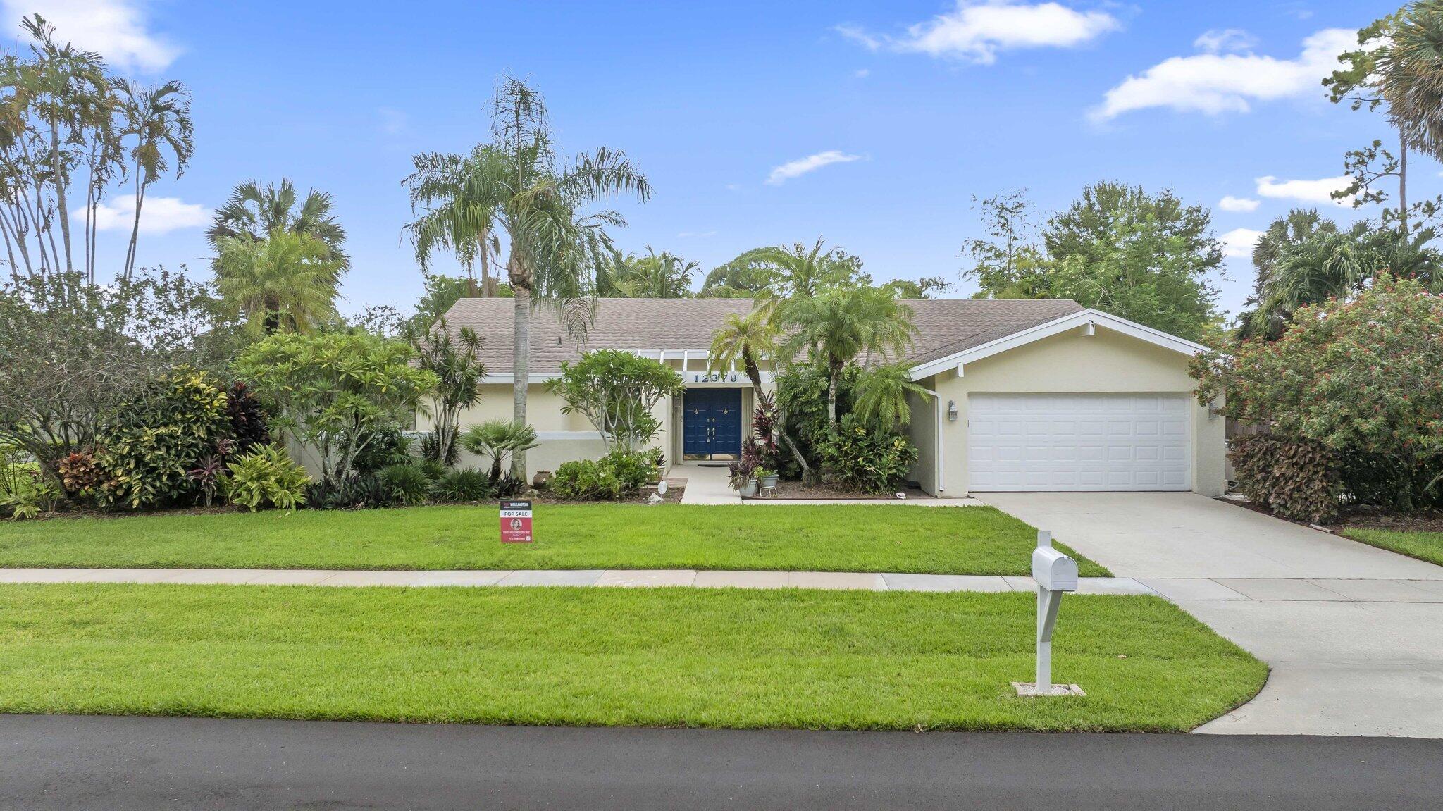Foto de propiedad en 12378 Sawgrass Court, Wellington, FL 33414 Wellington con MLS# 