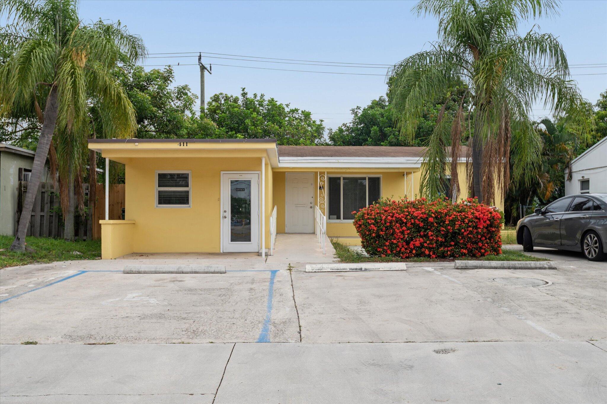 Foto de propiedad en 411 E Commercial Boulevard, Oakland Park, FL 33334 Oakland Park con MLS# 