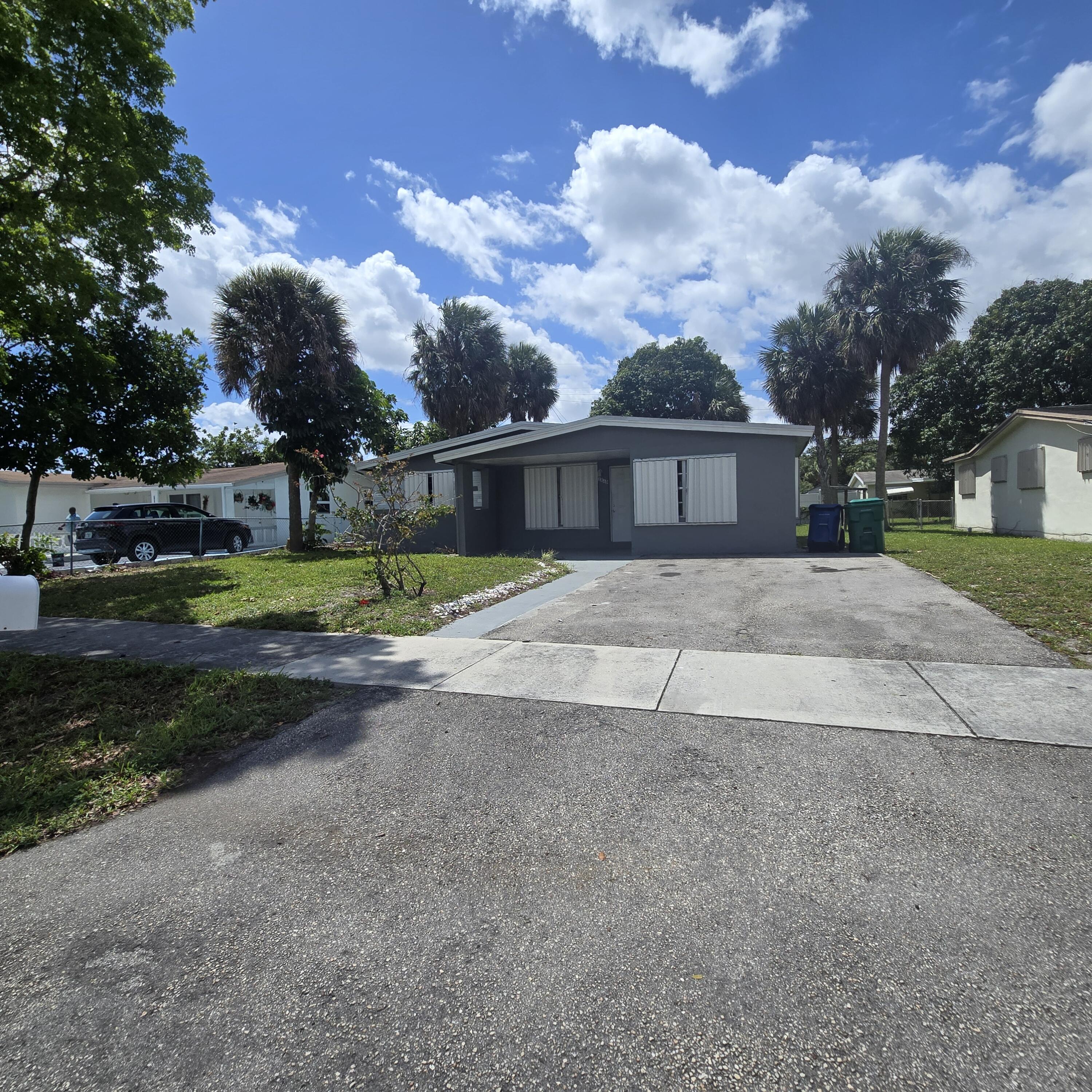 Foto de propiedad en 3860 NW 8th Place, Lauderhill, FL 33311 Lauderhill con MLS# 