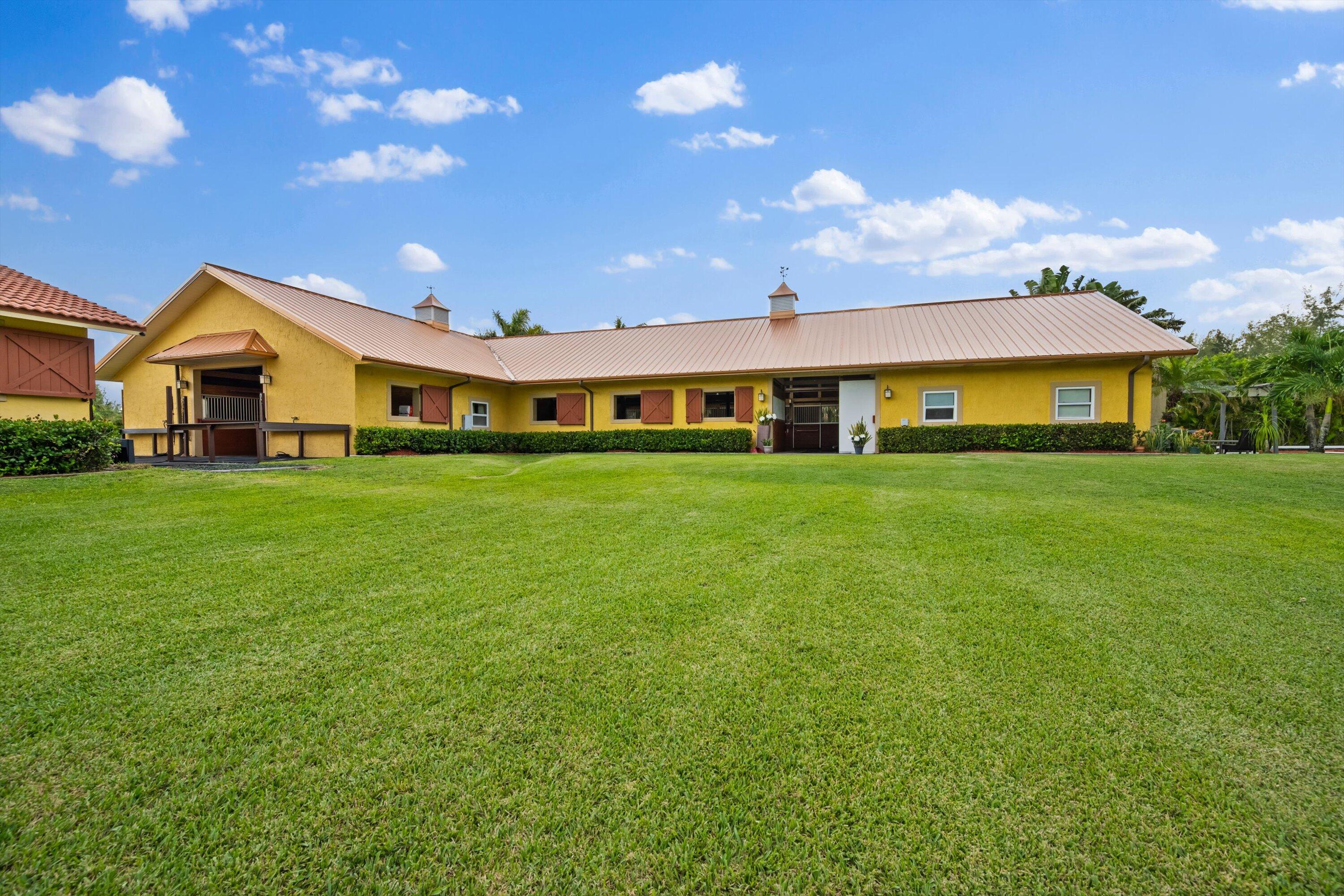 Foto de propiedad en 11861 Hawk Hollow, Wellington, FL 33449 Wellington con MLS# 