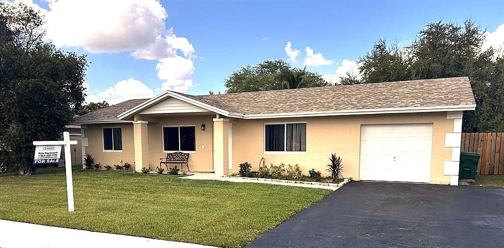 Foto de propiedad en 12541 SW 10th Court, Davie, FL 33325 Davie con MLS# 