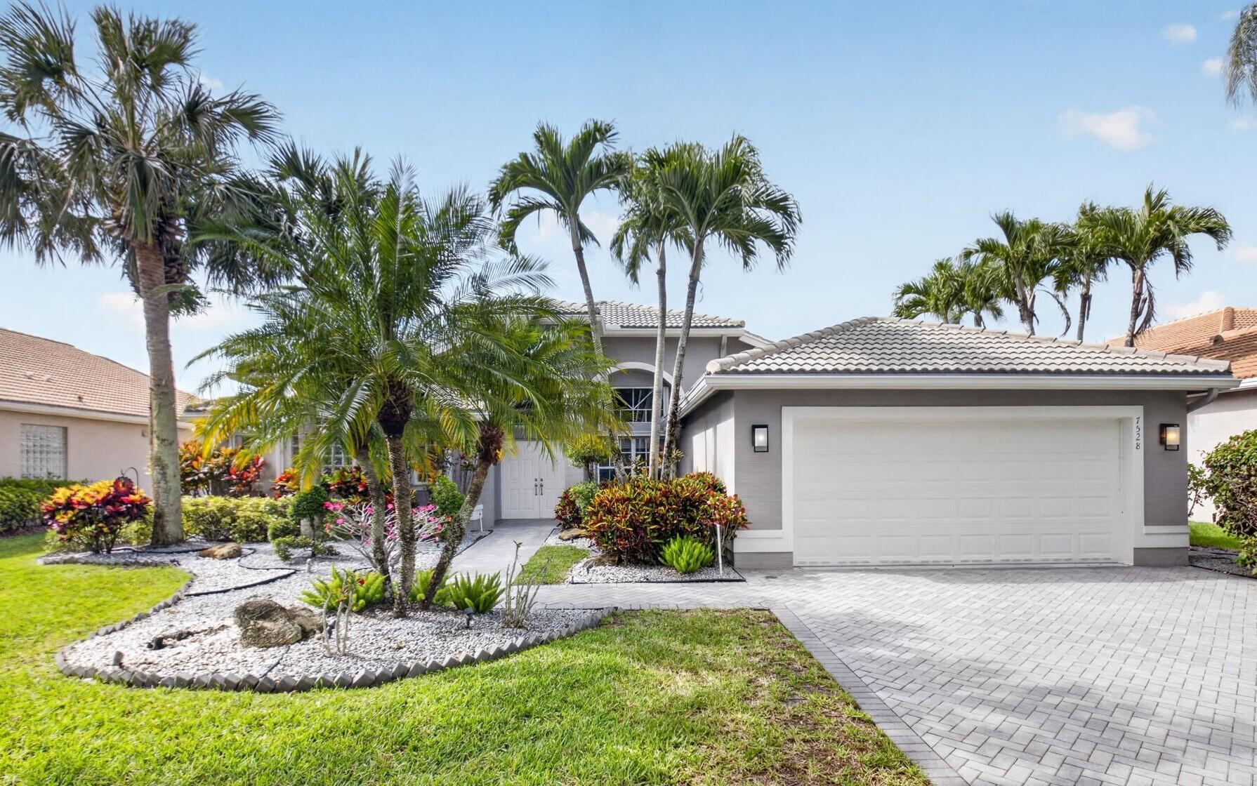 Foto de propiedad en 7528 Tarpon Cove Circle, Lake Worth, FL 33467 Lake Worth con MLS# 