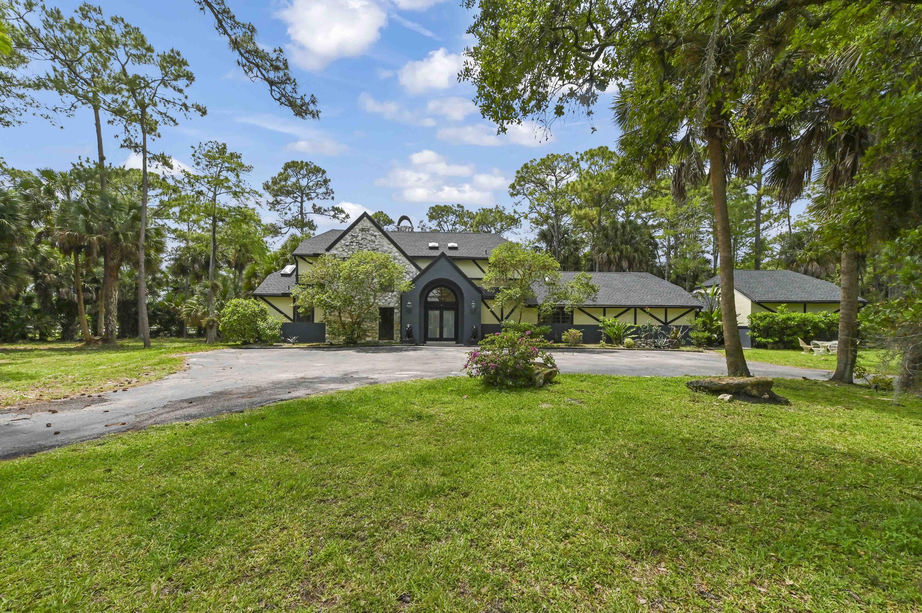 Foto de propiedad en 1339 Gallop Drive, Loxahatchee, FL 33470 Loxahatchee con MLS# 
