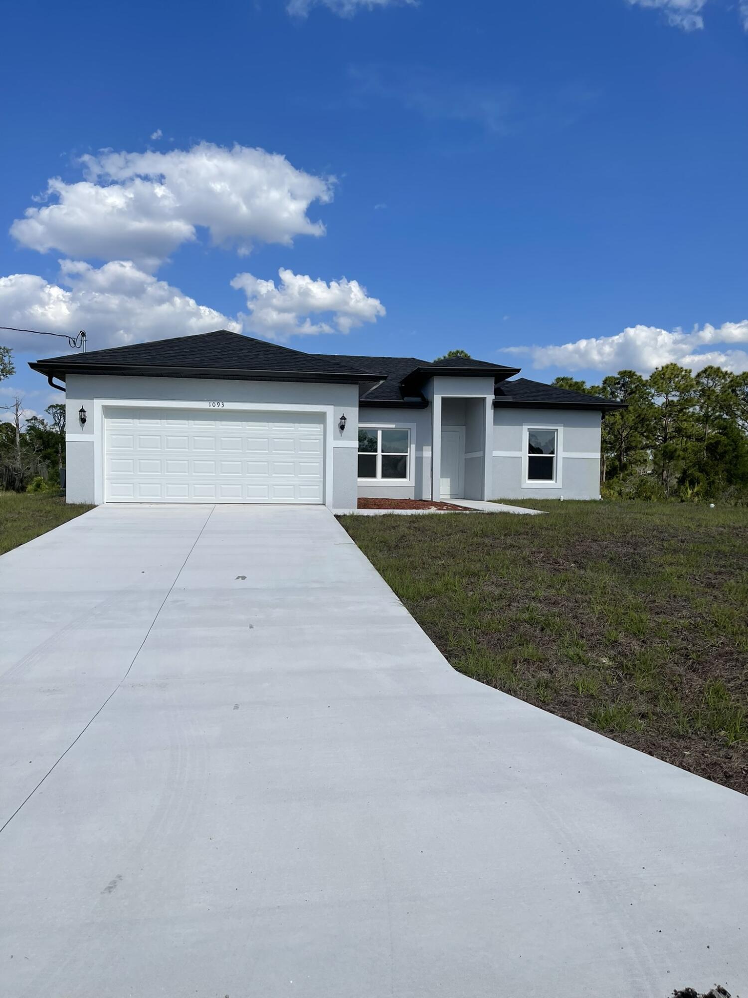 En Venta 322 Mangonia Avenue, Lehigh Acres, FL 33974, Lehigh Acres, FL 33974