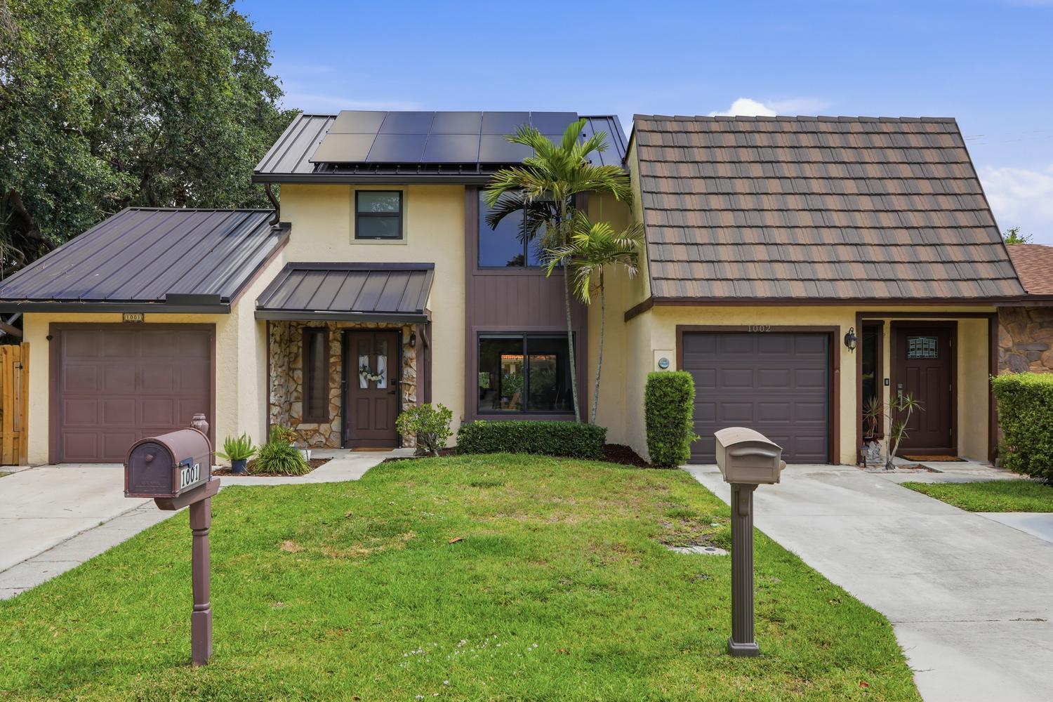 Foto de propiedad en 1001 Raintree Lane, Palm Beach Gardens, FL 33410 Palm Beach Gardens con MLS# 
