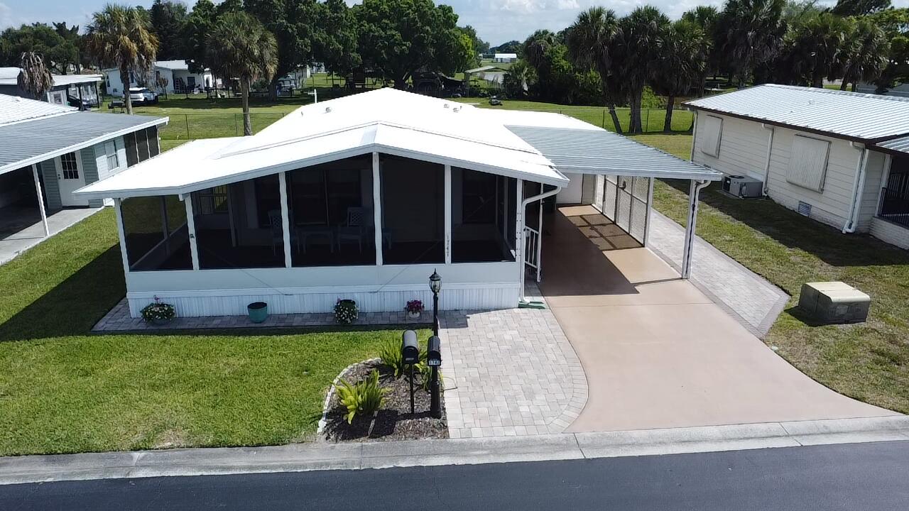 Foto de propiedad en 1747 SW 35th Circle, Okeechobee, FL 34974 Okeechobee con MLS# 