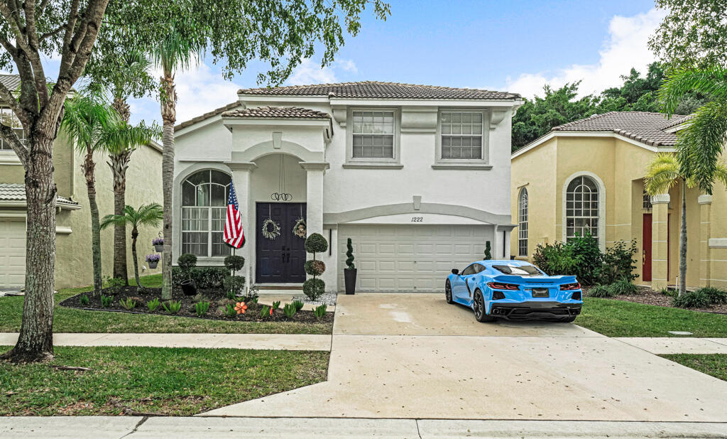 Foto de propiedad en 1222 Oakwater Drive, Royal Palm Beach, FL 33411 Royal Palm Beach con MLS# 