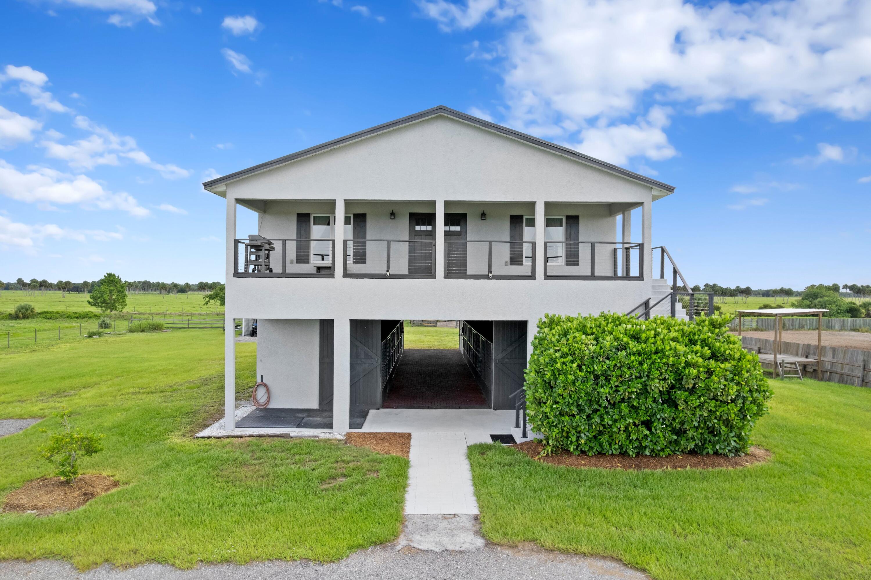 Foto de propiedad en 6536 SE 26th Trail, Okeechobee, FL 34974 Okeechobee con MLS# 