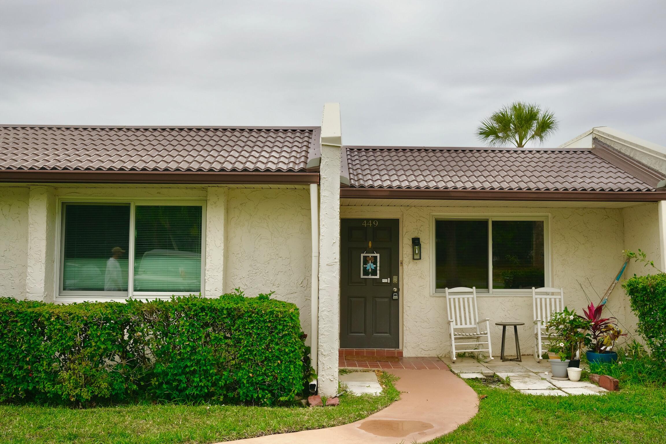 Foto de propiedad en 449 Golden River Drive, West Palm Beach, FL 33411 West Palm Beach con MLS# 