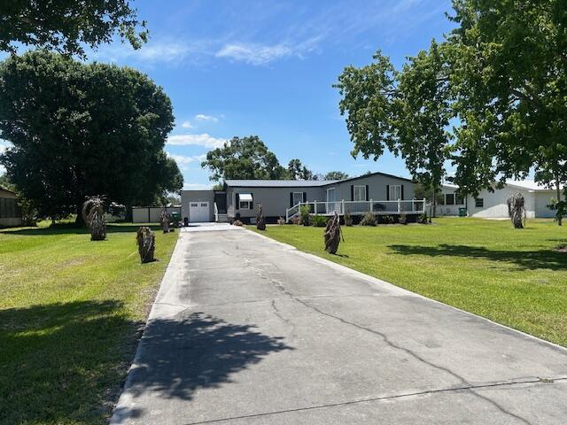 Foto de propiedad en 4031 SW 9th Way, Okeechobee, FL 34974 Okeechobee con MLS# 