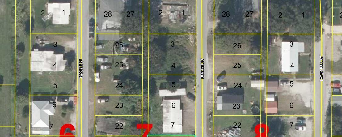 Foto de propiedad en 1075 Hendrix Street, Moore Haven, FL 33471 Moore Haven con MLS# 