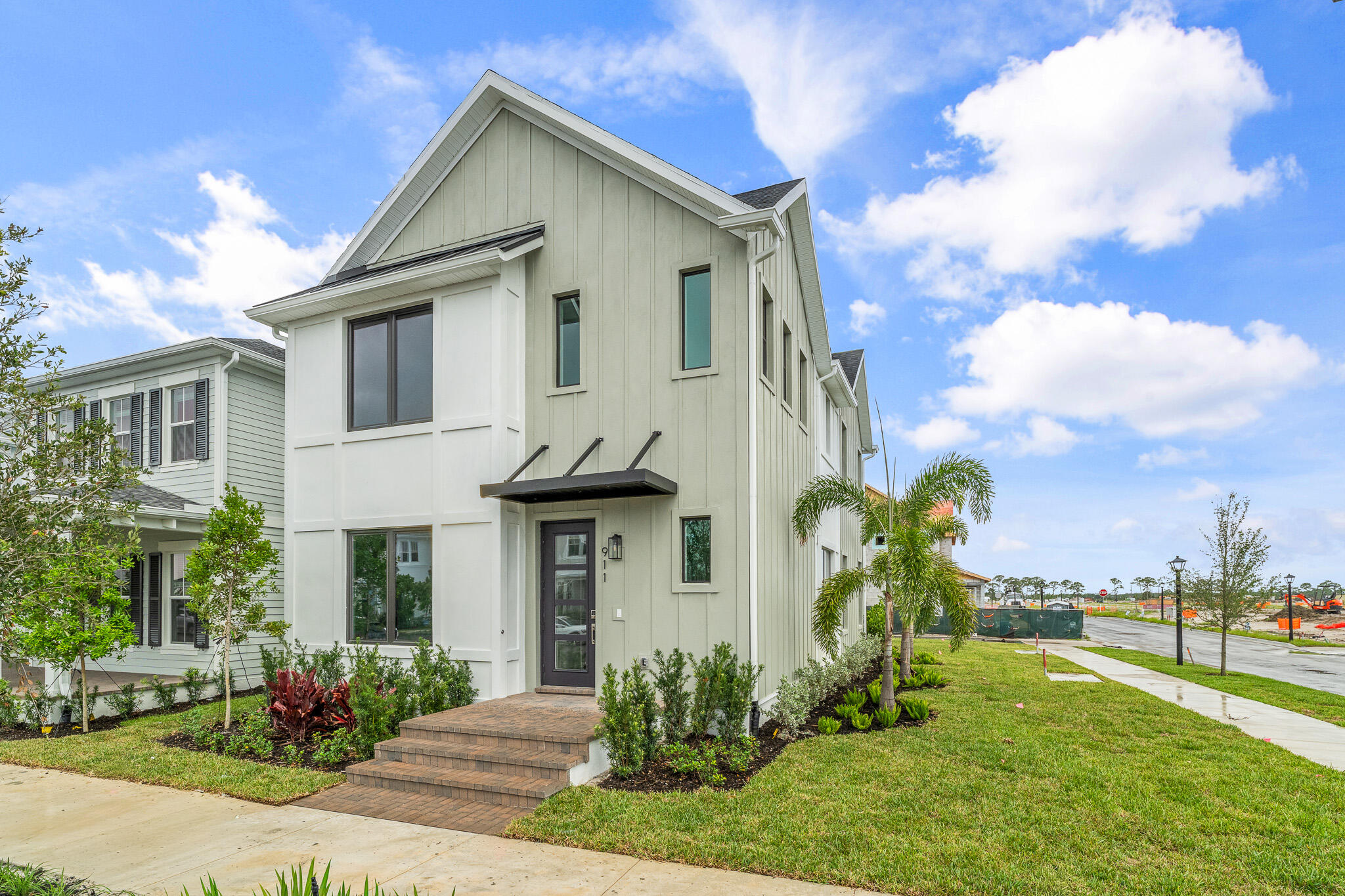 Foto de propiedad en 911 SW Newfield Avenue, Palm City, FL 34990 Palm City con MLS# 