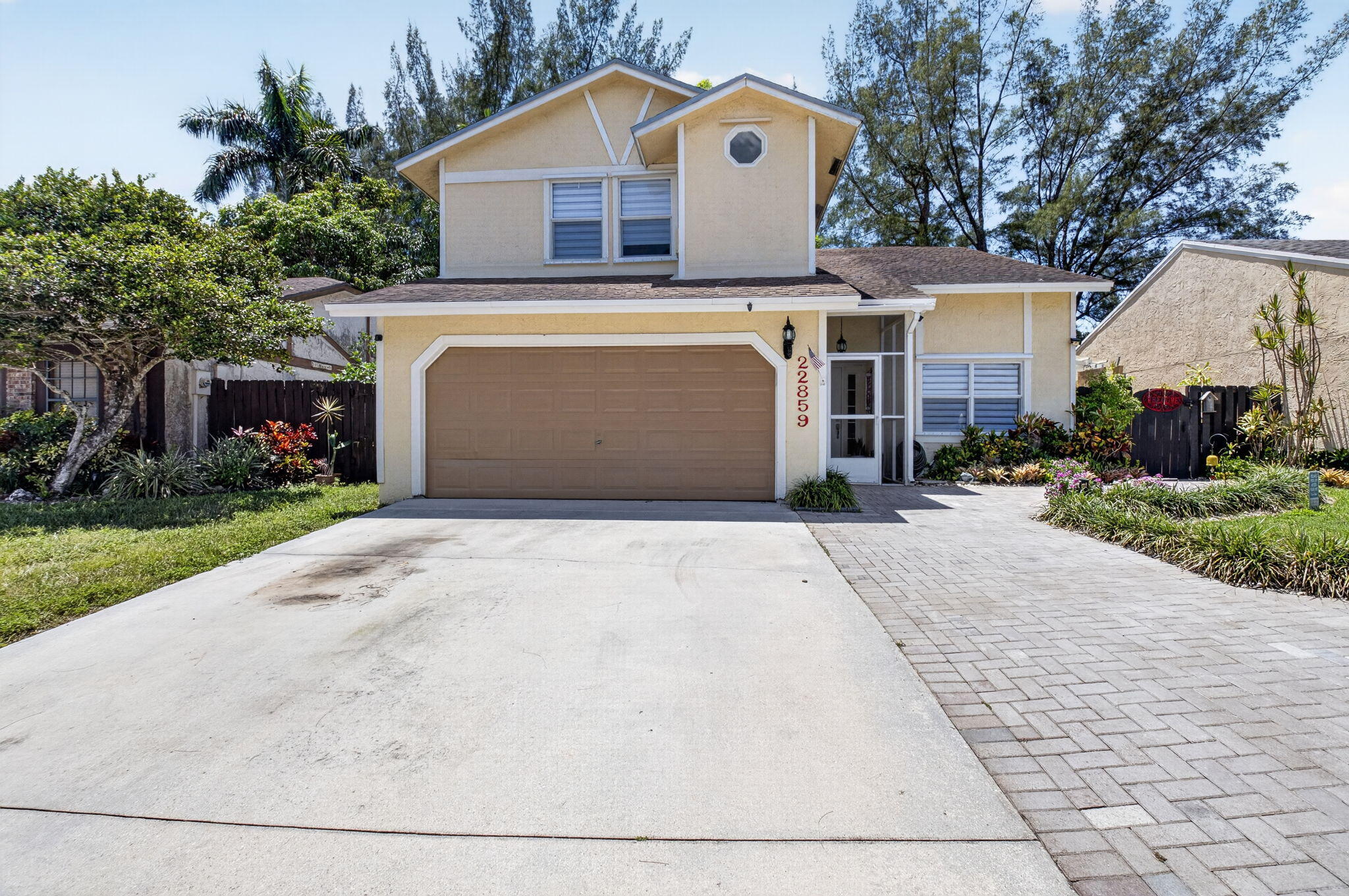 Foto de propiedad en 22859 N Sandalfoot Boulevard, Boca Raton, FL 33428 Boca Raton con MLS# 