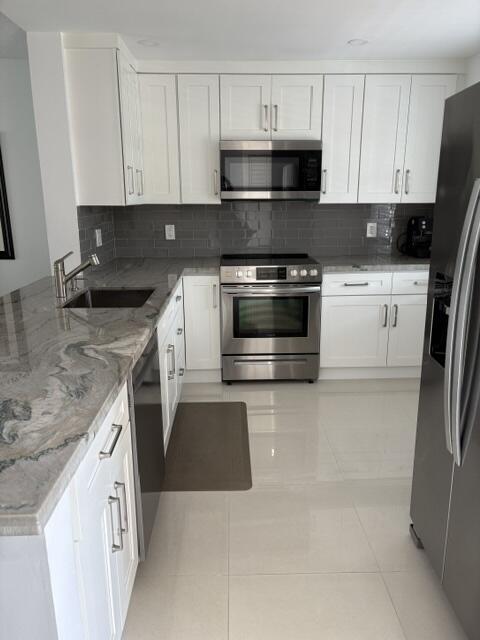 Foto de propiedad en 424 SE 10th Street 203, Dania Beach, FL 33004 Dania Beach con MLS# 