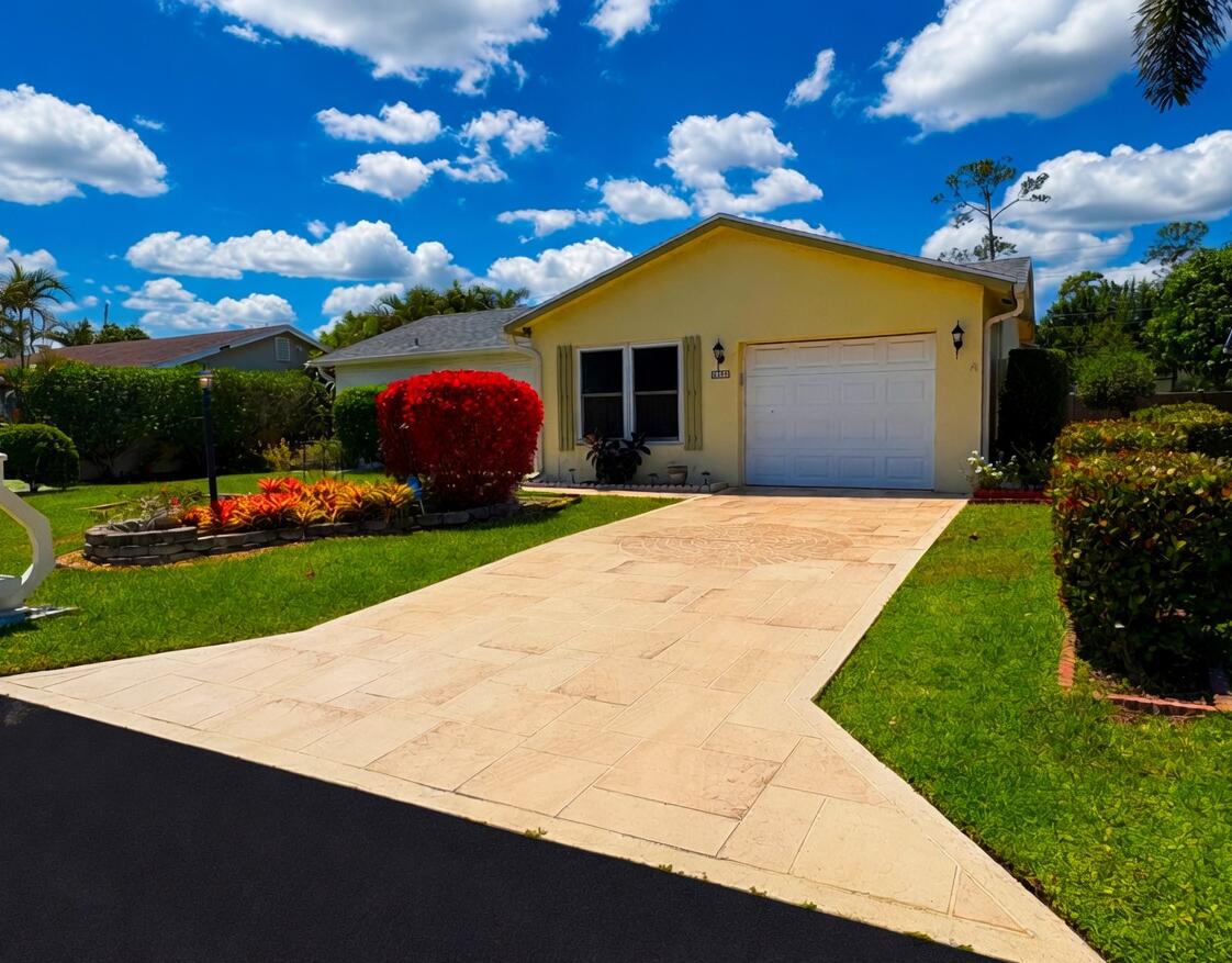 Foto de propiedad en 6304 Emerald Sky Lane, Greenacres, FL 33463 Greenacres con MLS# 