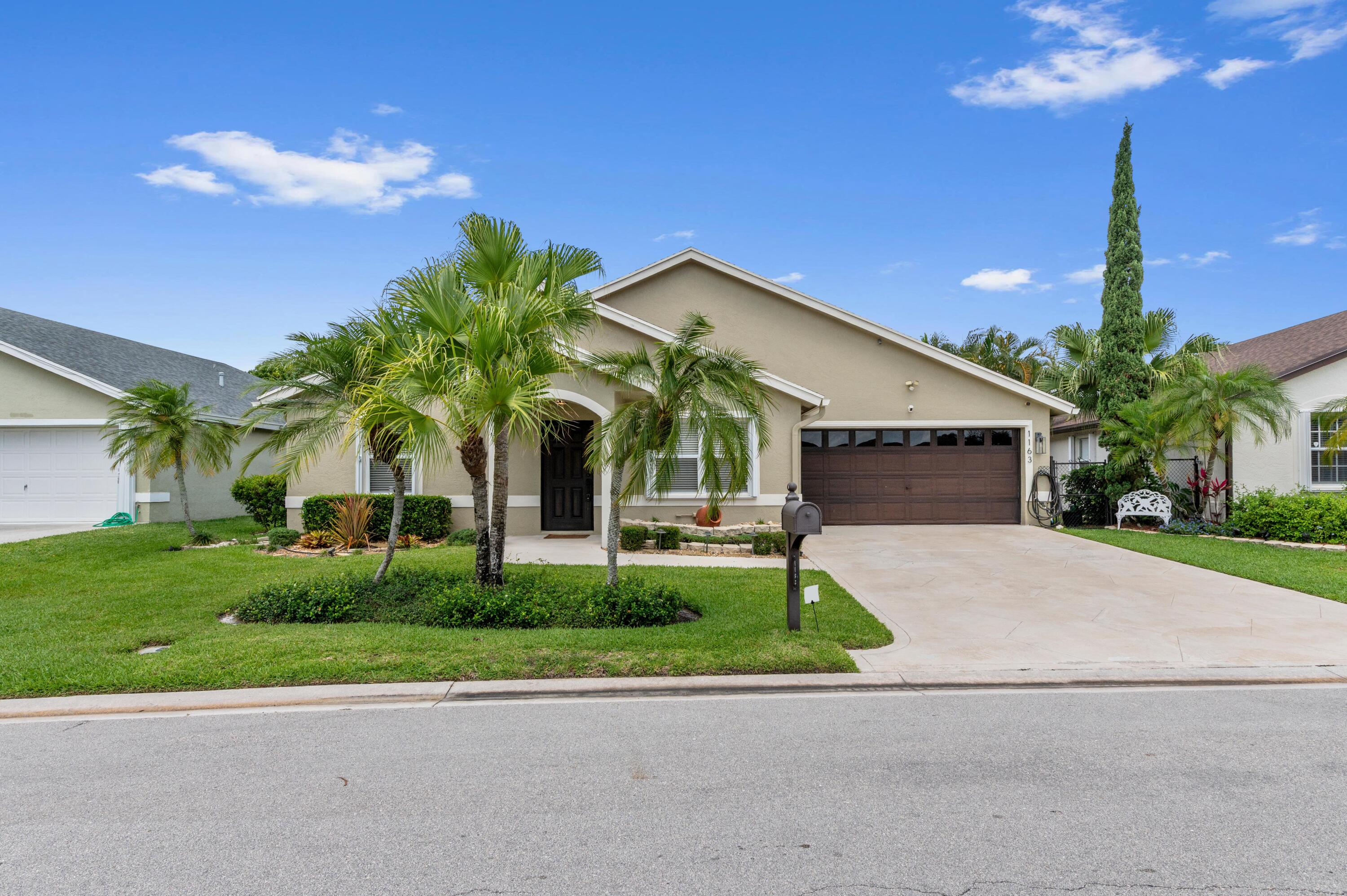 Foto de propiedad en 1163 Peninsula Way, Greenacres, FL 33413 Greenacres con MLS# 