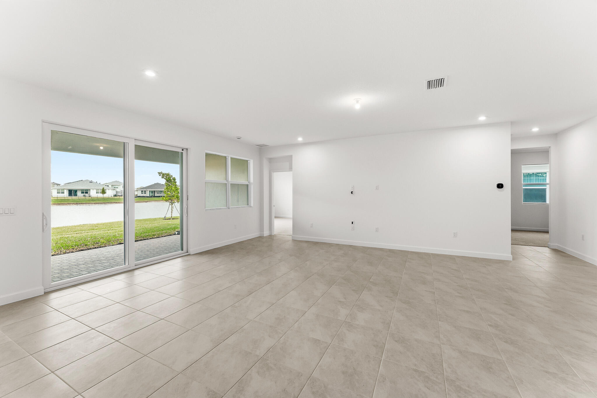 Foto de propiedad en 10881 SW Orana Drive, Port St. Lucie, FL 34987 Port St. Lucie con MLS# 