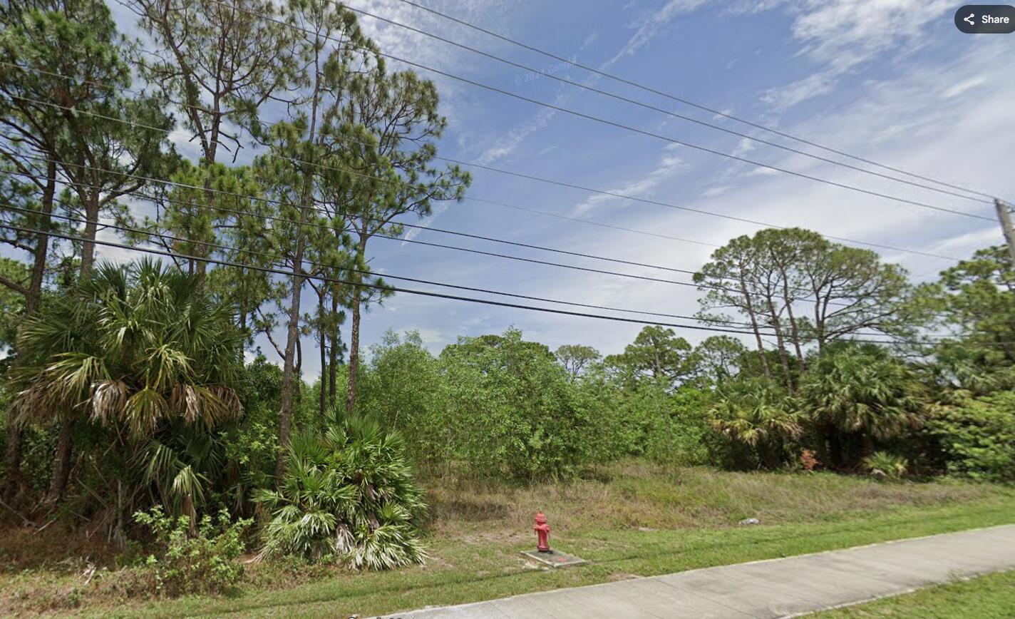 Foto de propiedad en 325 NW Prima Vista Boulevard, Port St. Lucie, FL 34983 Port St. Lucie con MLS# 