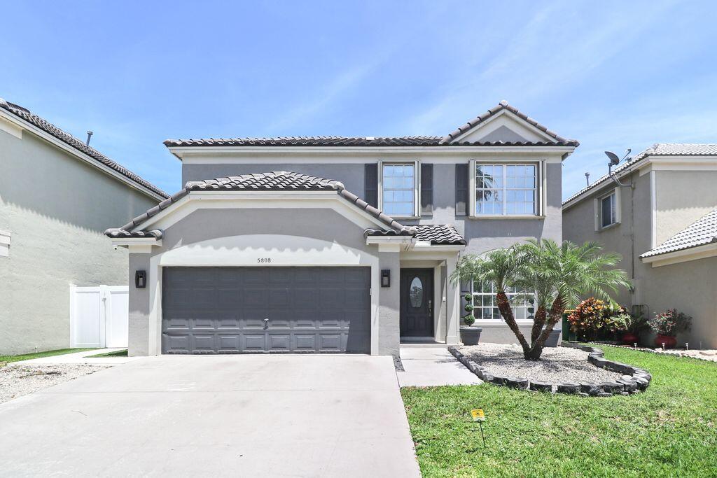 Foto de propiedad en 5808 N Plum Bay Parkway, Tamarac, FL 33321 Tamarac con MLS# 