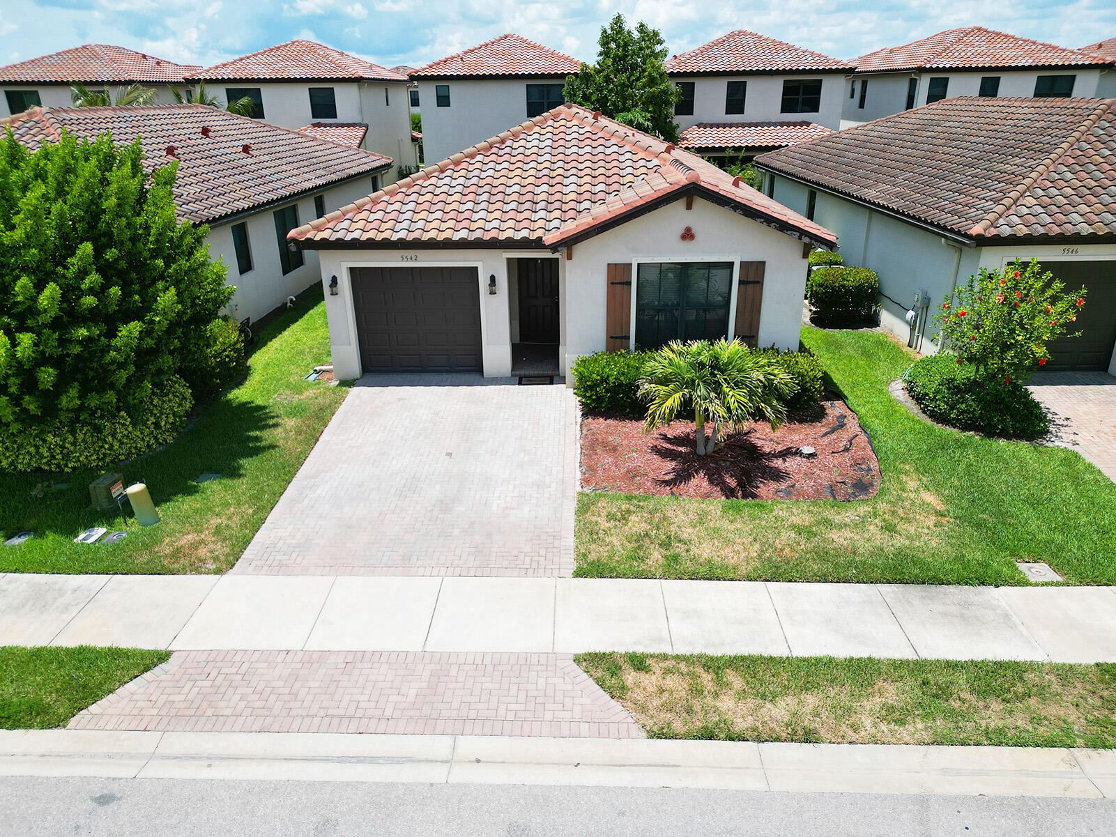 Foto de propiedad en 5542 Useppa Drive, Ave Maria, FL 34142 Ave Maria con MLS# 