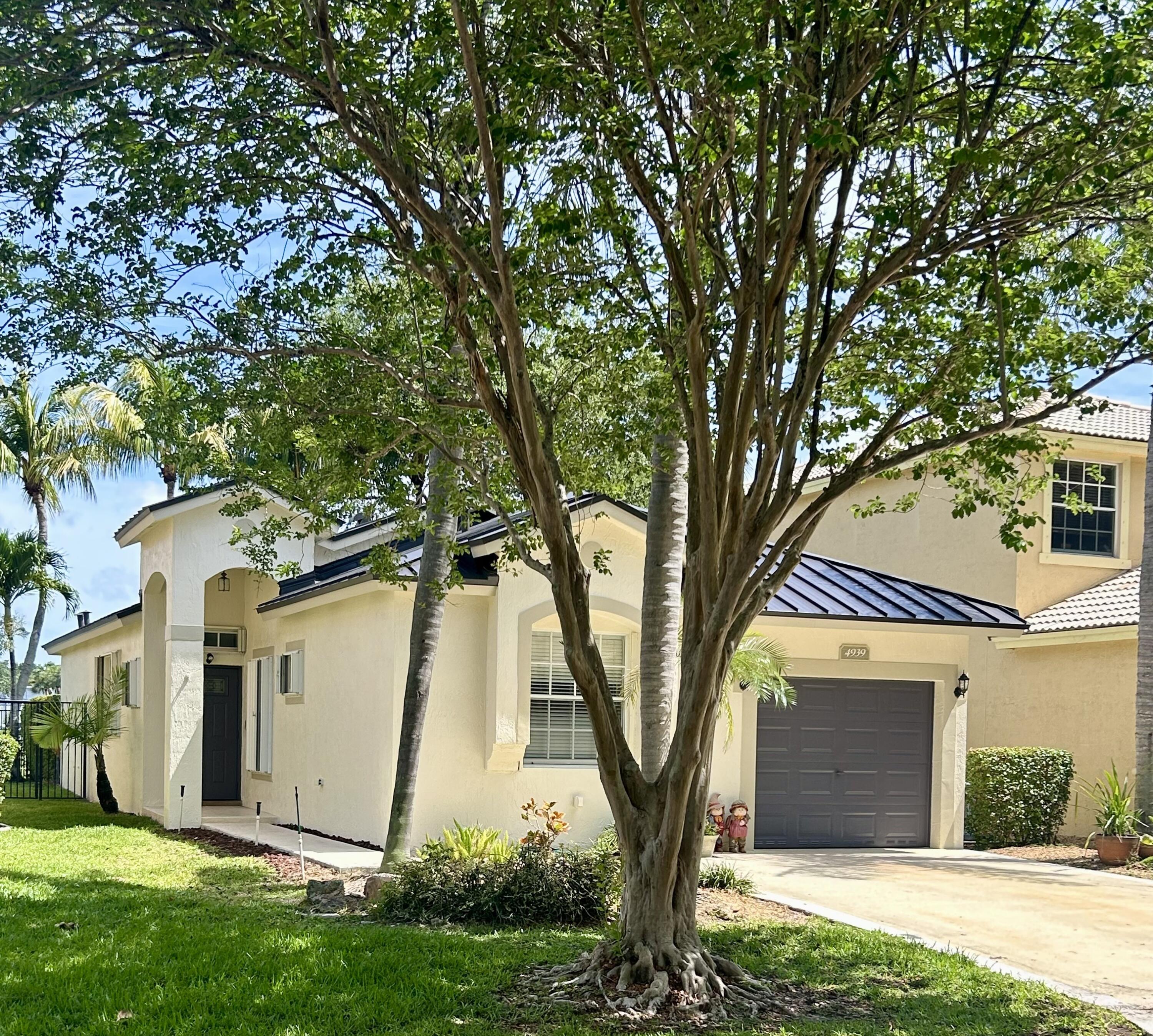 Foto de propiedad en 4939 Pelican Street, Coconut Creek, FL 33073 Coconut Creek con MLS# 