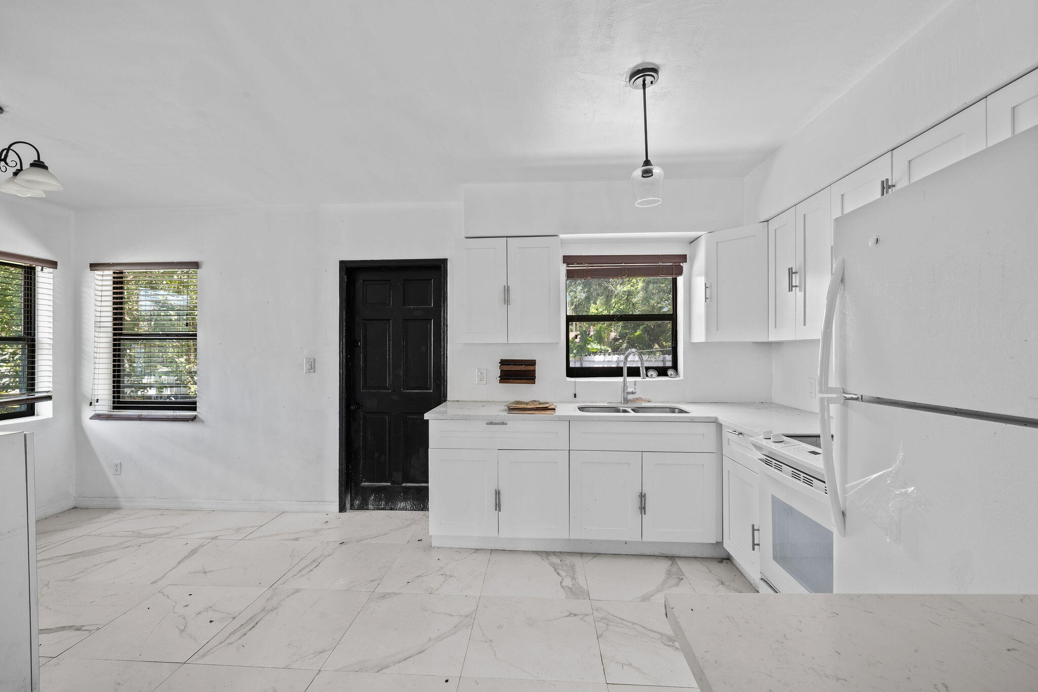 Foto de propiedad en 515 NW 88th Street, El Portal, FL 33150 El Portal con MLS# 