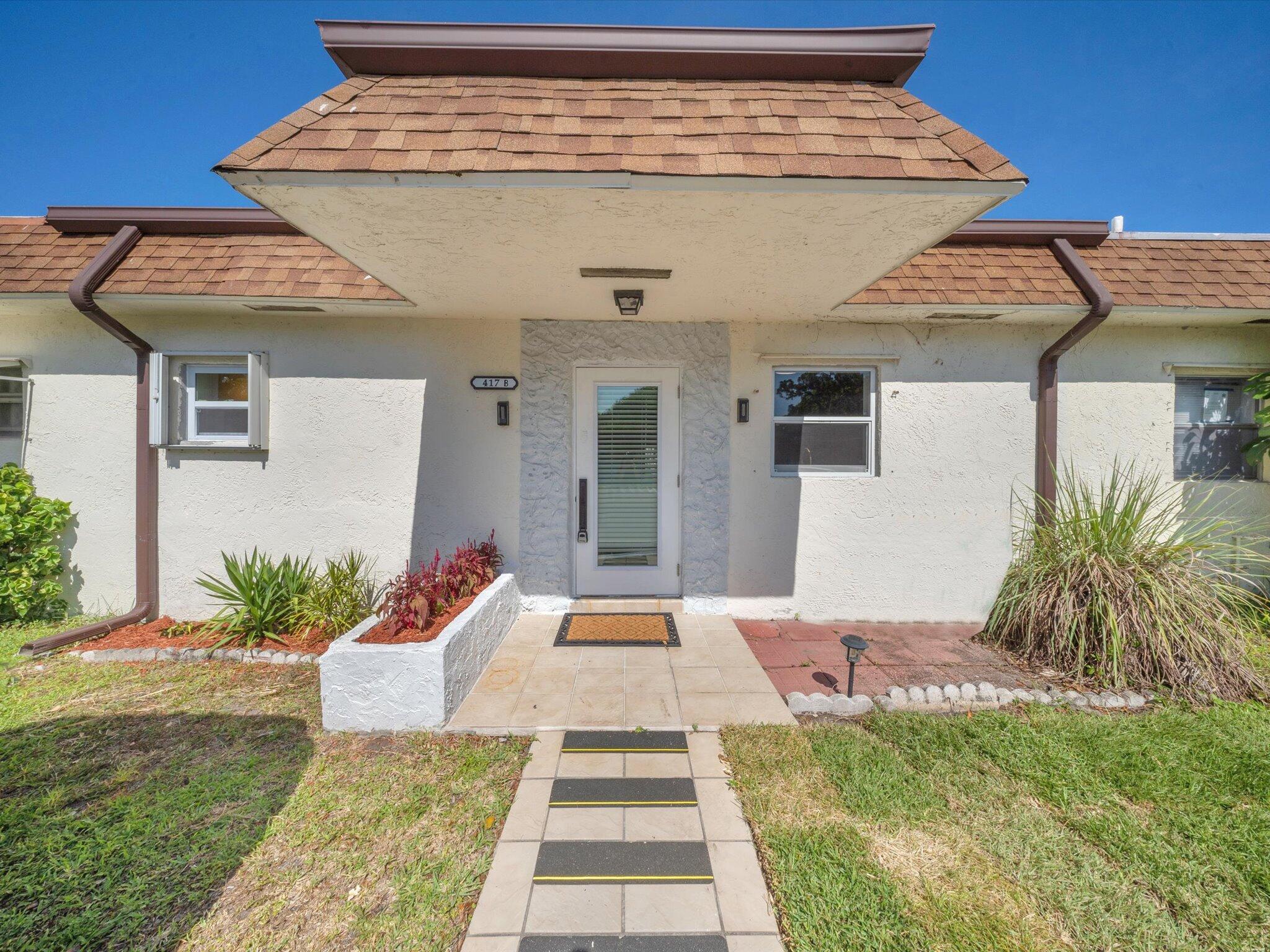 Foto de propiedad en 417 SW Natura Avenue B, Deerfield Beach, FL 33441 Deerfield Beach con MLS# 