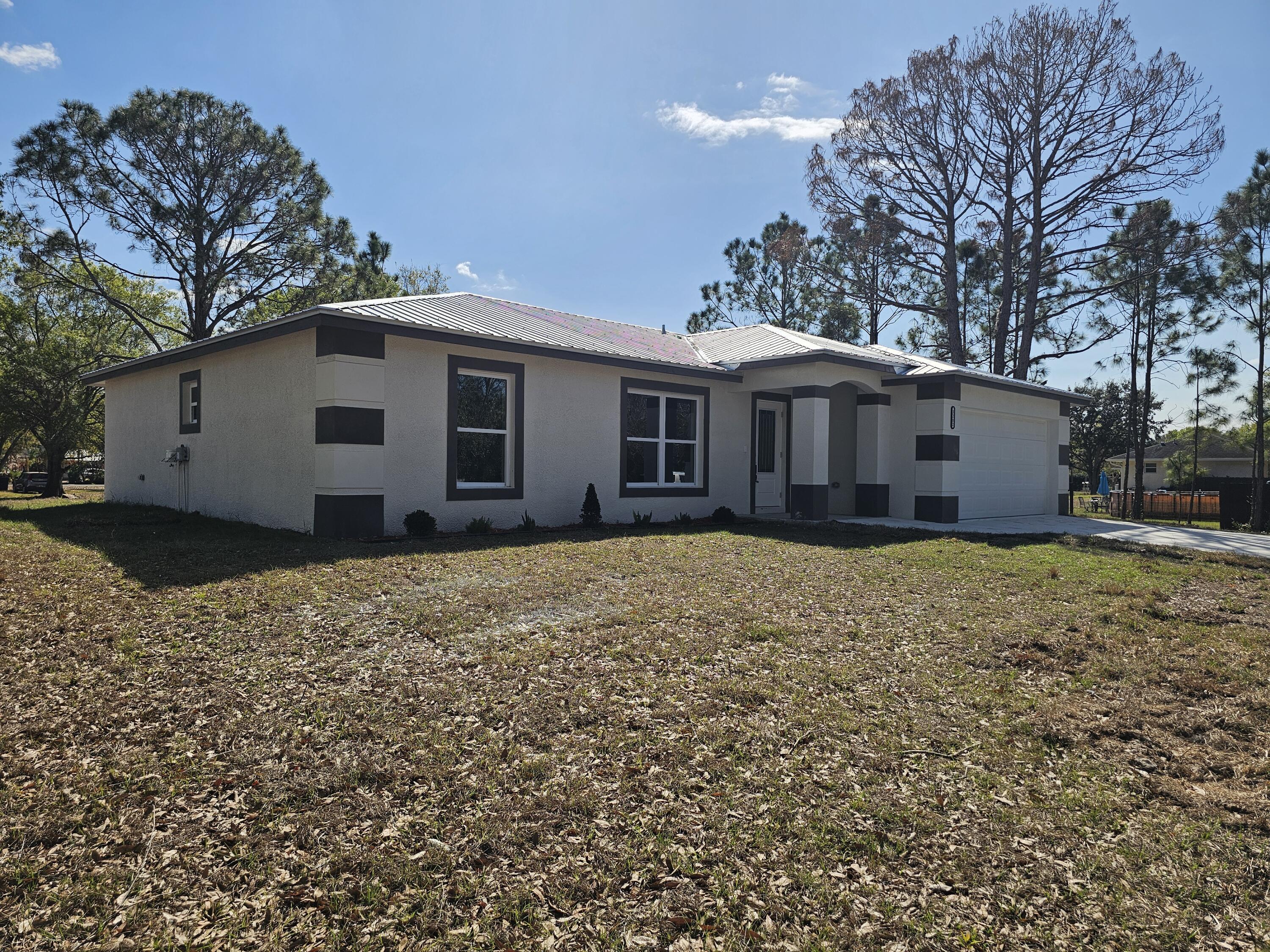 Foto de propiedad en 2964 NW 36th Avenue, Okeechobee, FL 34972 Okeechobee con MLS# 