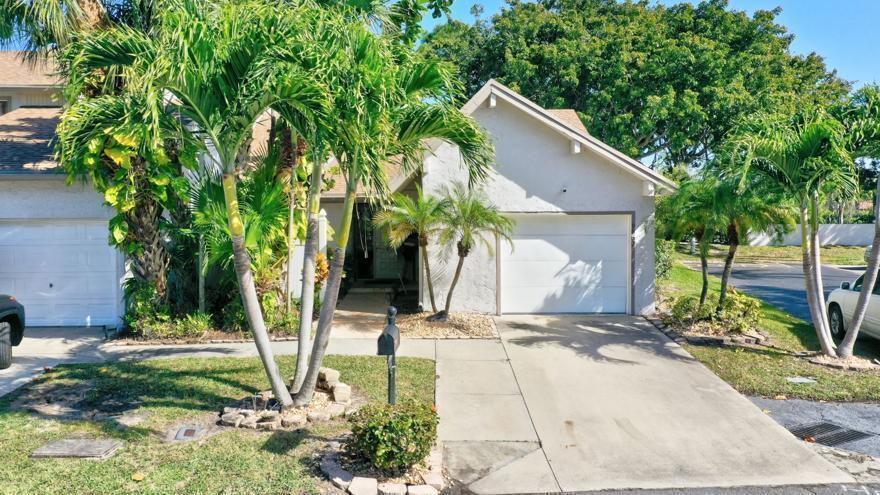 Foto de propiedad en 6660 Canary Palm Circle, Boca Raton, FL 33433 Boca Raton con MLS# 