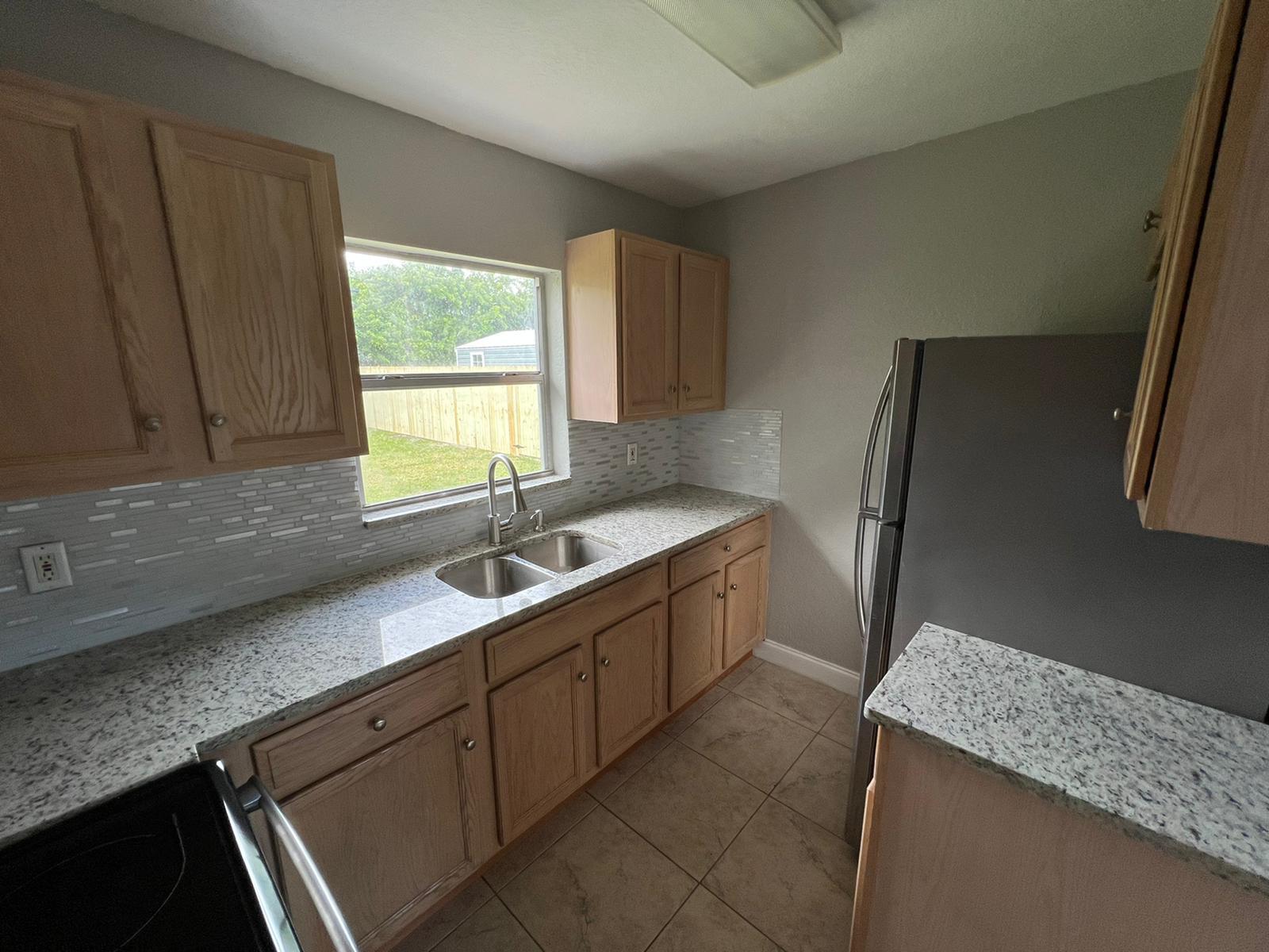 Foto de propiedad en 1883 Breezy Lane, West Palm Beach, FL 33417 West Palm Beach con MLS# 