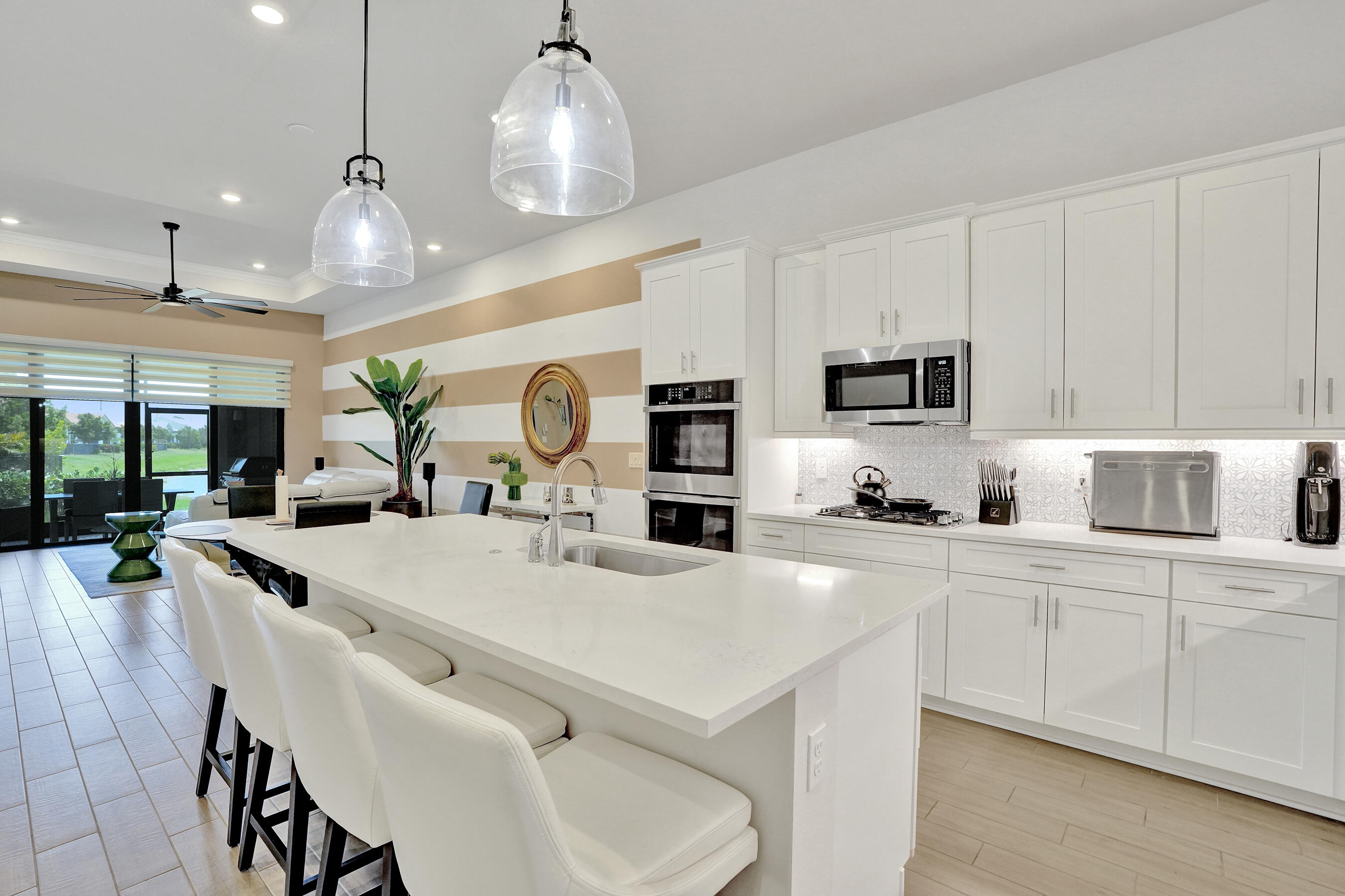 Foto de propiedad en 8334 W Blue Spring Drive 8334, Parkland, FL 33067 Parkland con MLS# 
