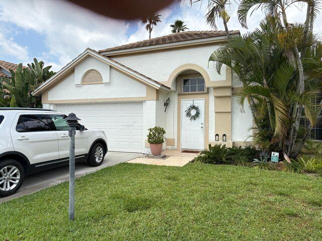 Foto de propiedad en 12665 Coral Breeze Drive, Wellington, FL 33414 Wellington con MLS# 