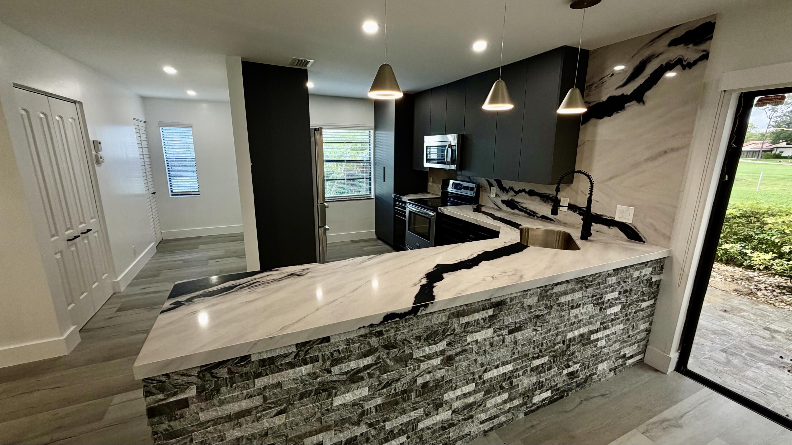 Foto de propiedad en 21695 Tall Palm Circle 4a, Boca Raton, FL 33433 Boca Raton con MLS# 