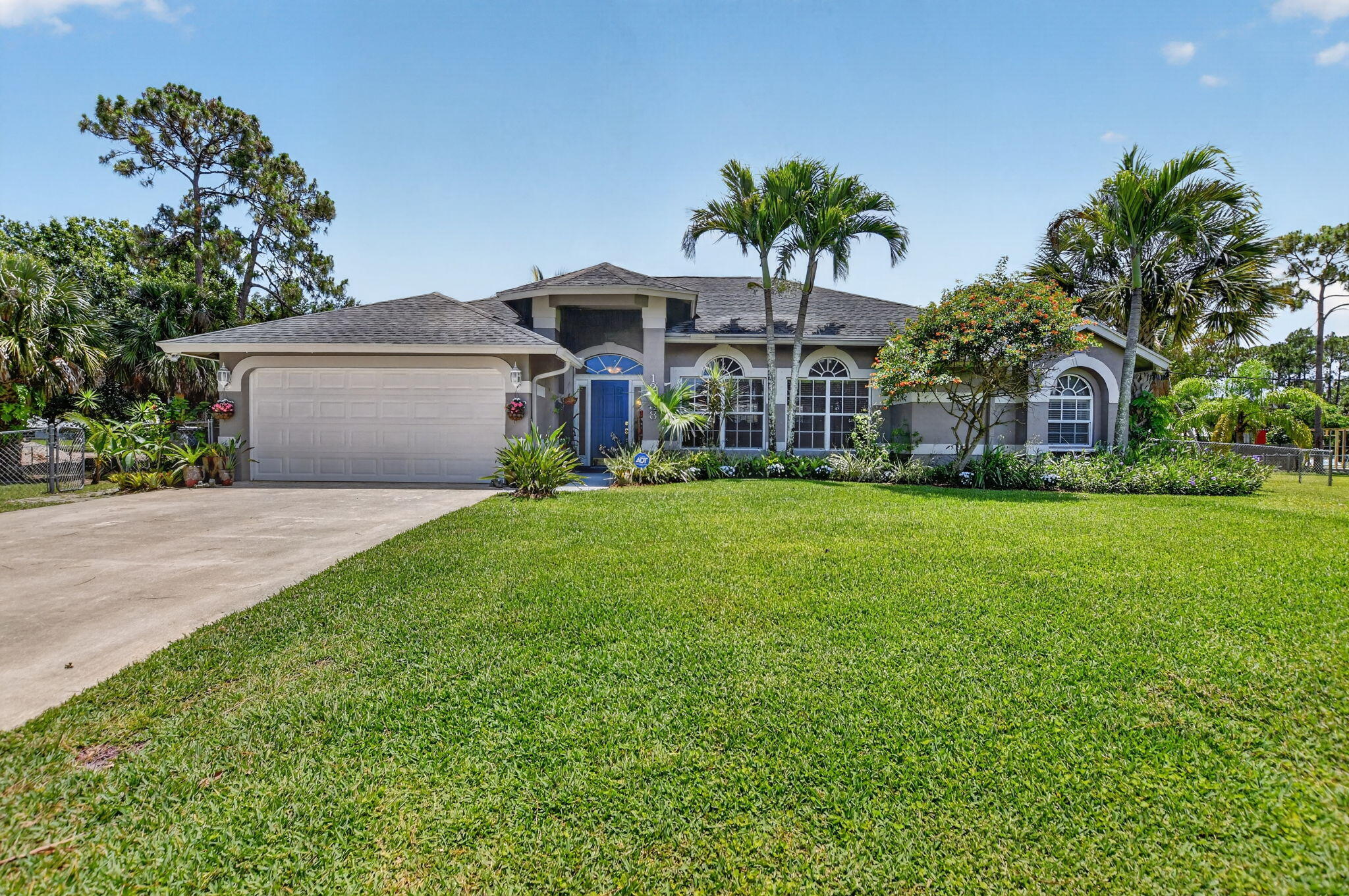 Foto de propiedad en 12838 72nd Court N, The Acreage, FL 33412 The Acreage con MLS# 