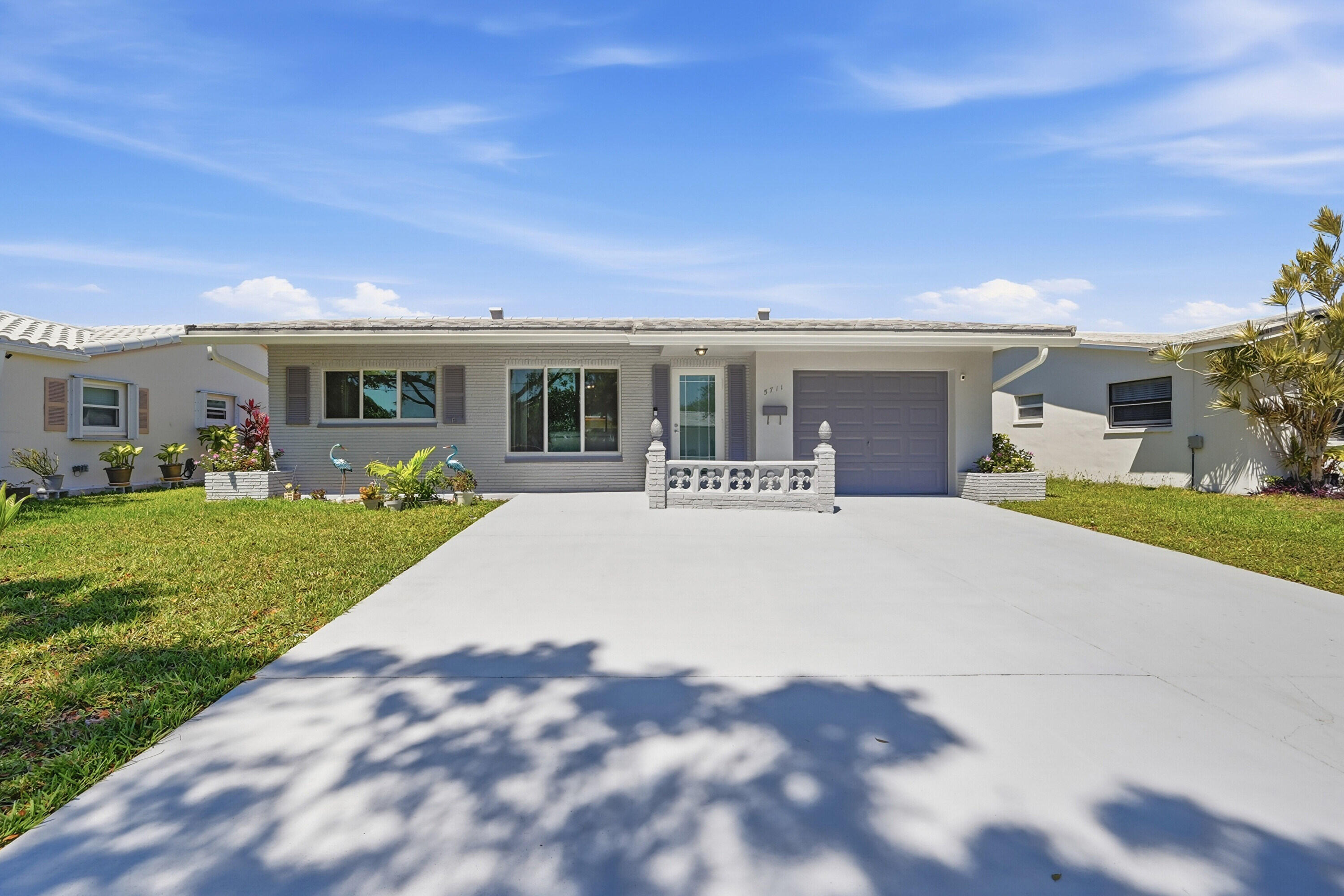 Foto de propiedad en 5711 NW 84th Terrace, Tamarac, FL 33321 Tamarac con MLS# 