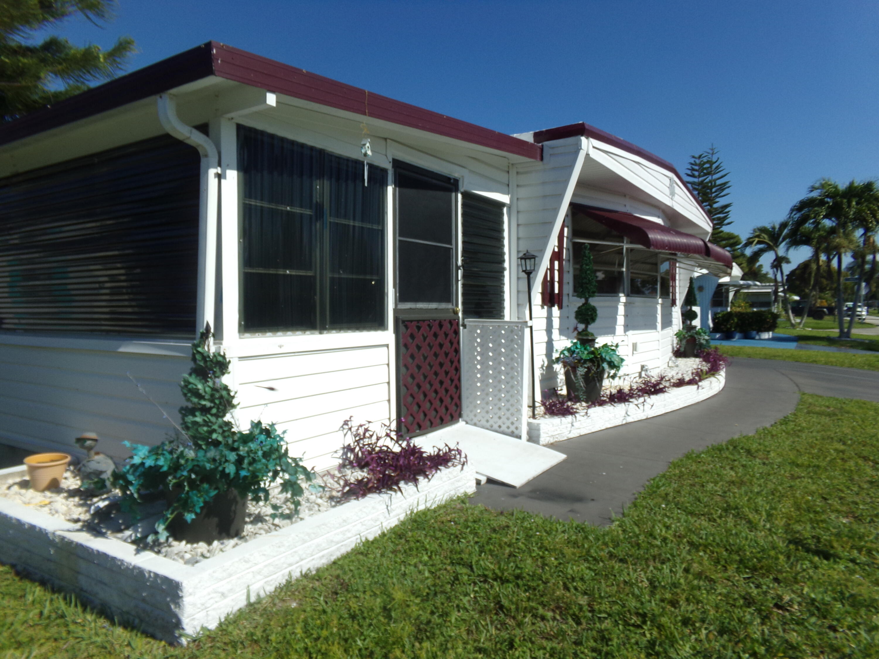 Foto de propiedad en 6385 Cypress Lane, Atlantis, FL 33462 Atlantis con MLS# 