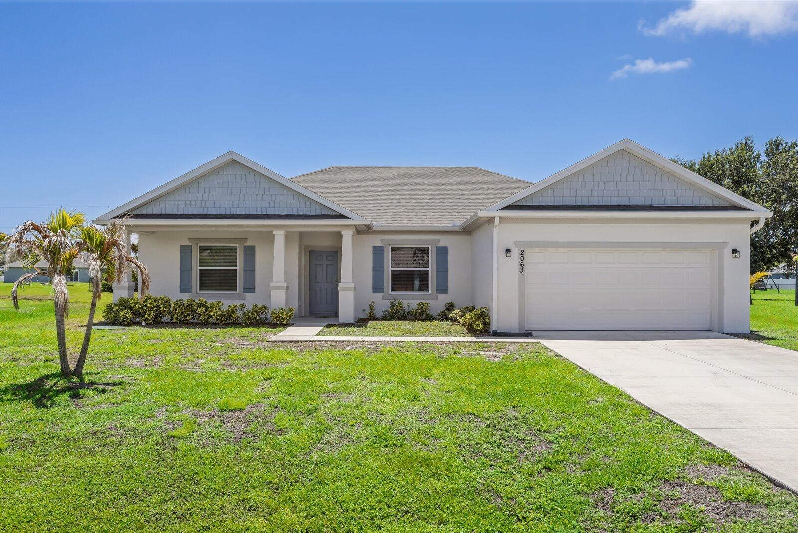 Foto de propiedad en 2063 SE South Buttonwood Drive, Port St. Lucie, FL 34952 Port St. Lucie con MLS# 