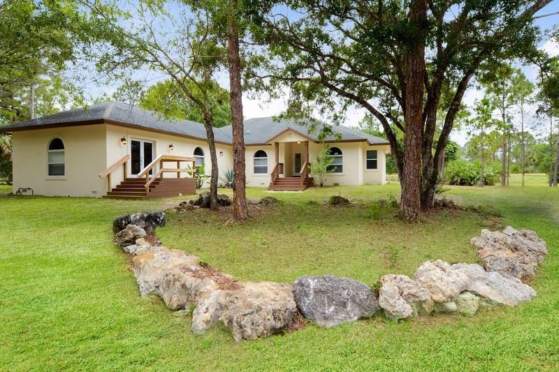Foto de propiedad en 4935 Lame Panther Lane, Loxahatchee, FL 33470 Loxahatchee con MLS# 