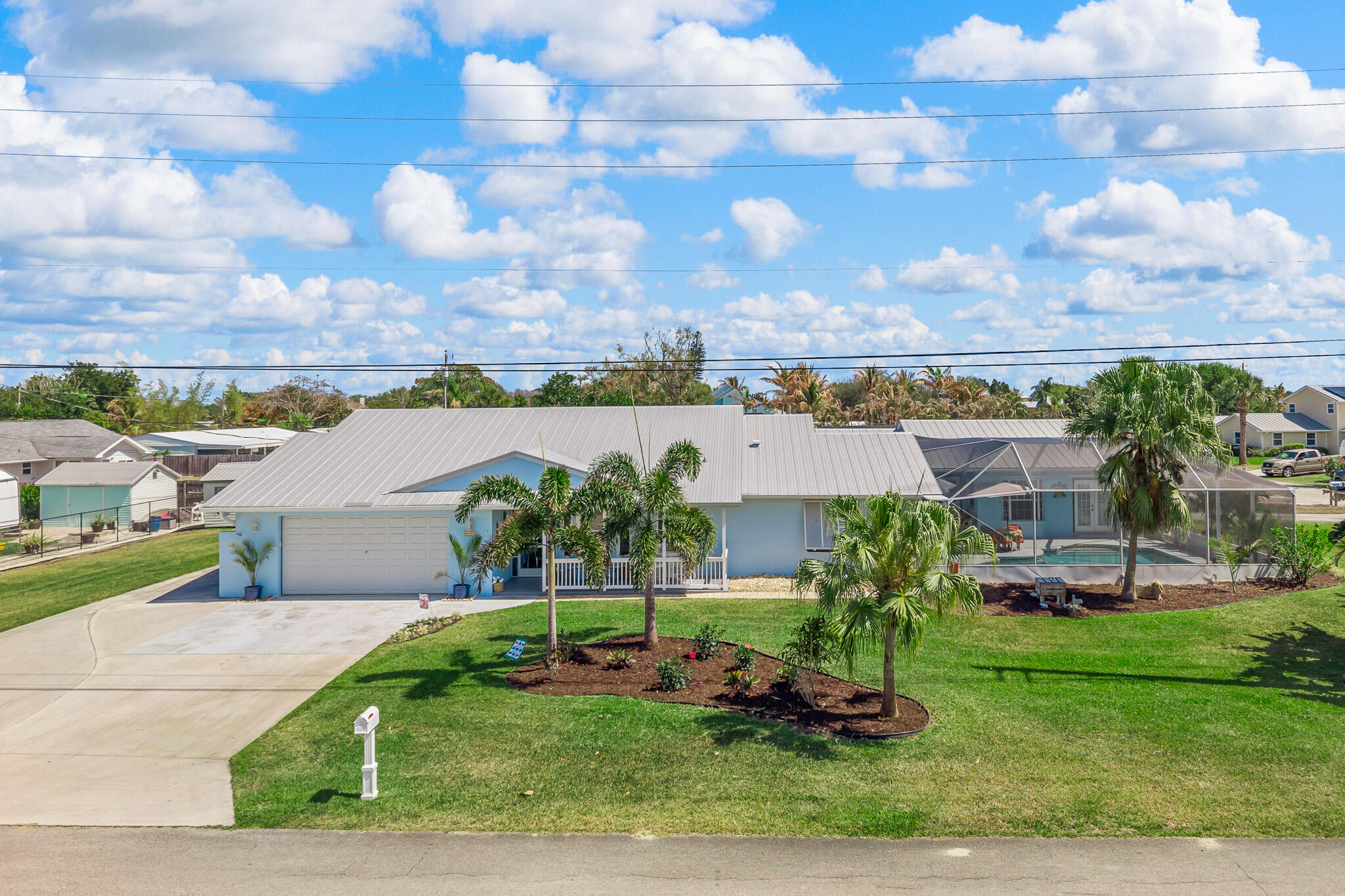 Foto de propiedad en 4459 SE Kubin Avenue, Stuart, FL 34997 Stuart con MLS# 