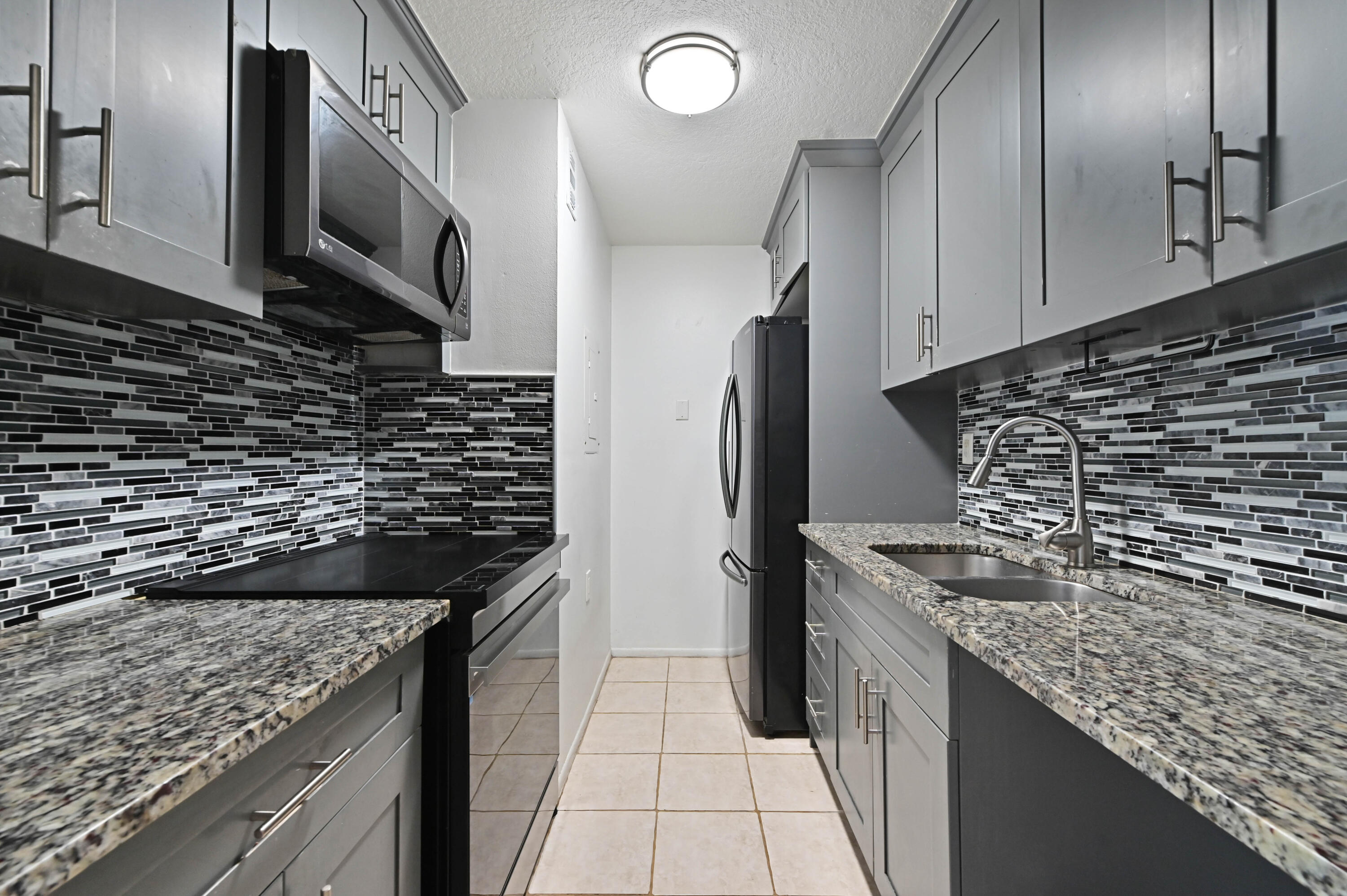 Foto de propiedad en 1089 N Benoist Farms Road 205, West Palm Beach, FL 33411 West Palm Beach con MLS# 